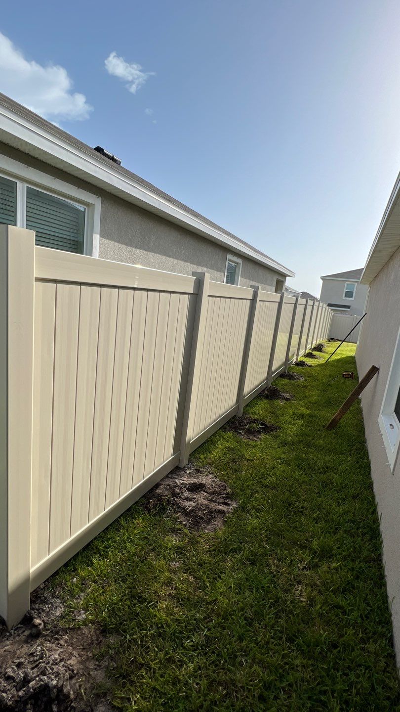 Tan Vinyl Privacy Fence Installation by Asap fence and gates, LLC
