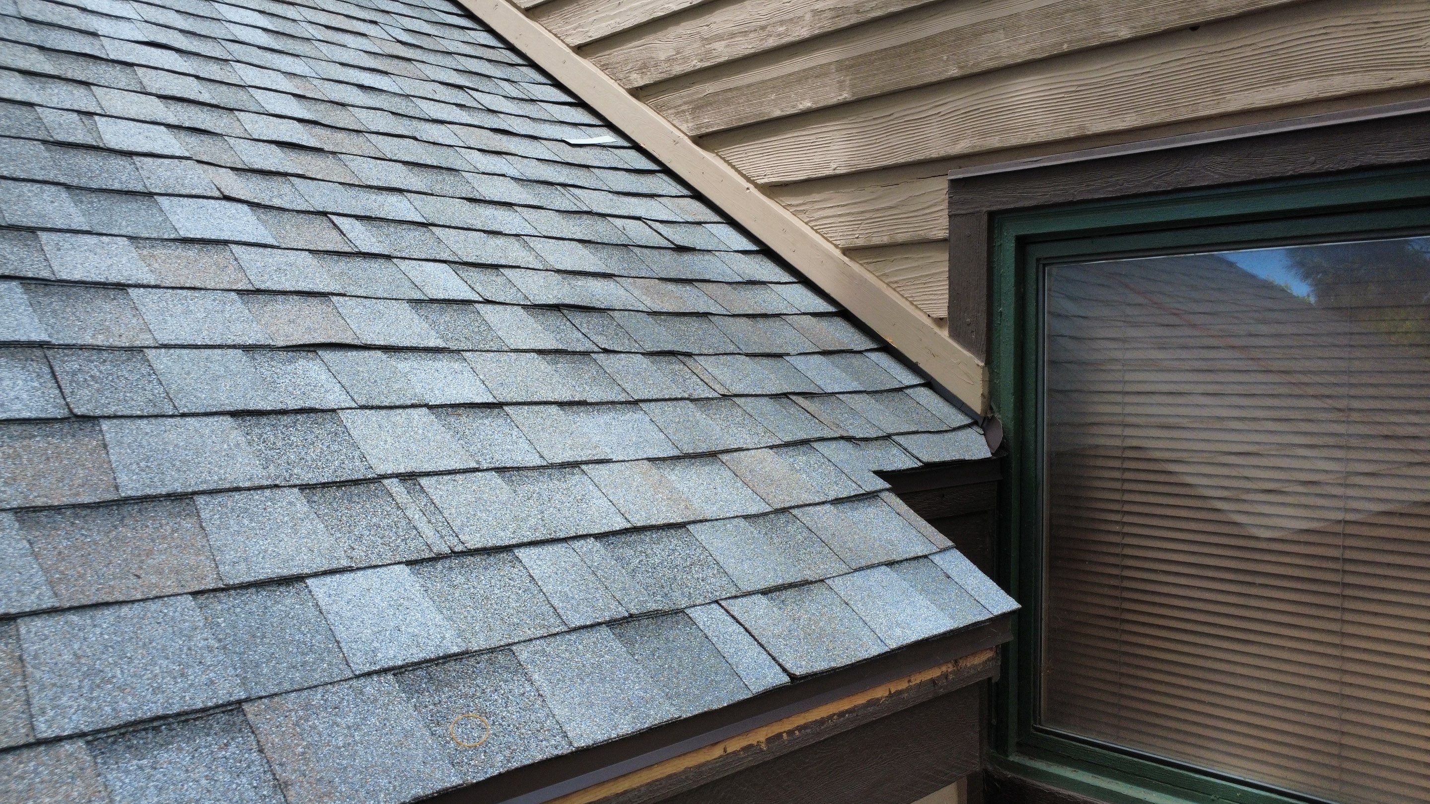 Asphalt Shingle and Skylight Replacement Project in Denver, CO by Blue Peaks Roofing LLC 