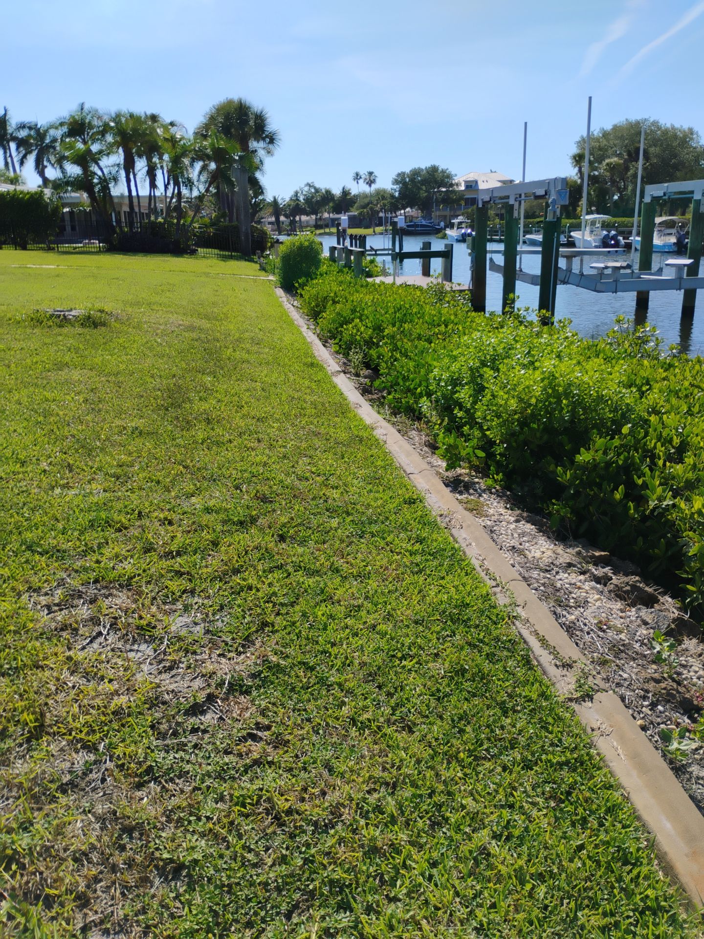 Black Aluminum Waterfront Fence Installation in Osprey by True Fence LLC