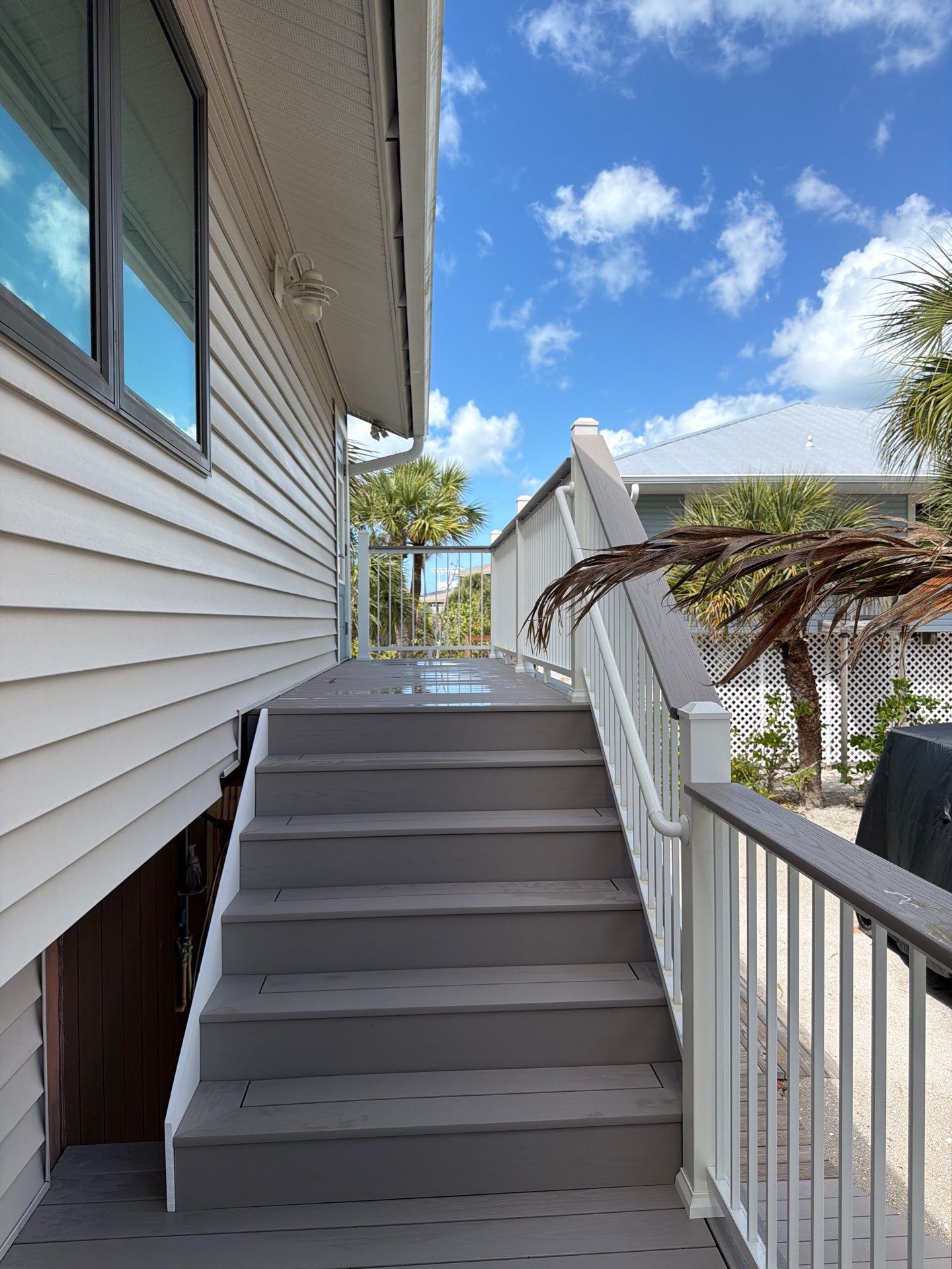 Elevated Deck and Composite Staircase Replacement in Placida Florida by Smirnov Construction Inc