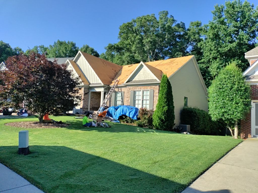 Residential Roofing Installation using Owens Corning Quary Gray by Inspector Roofing and Restoration