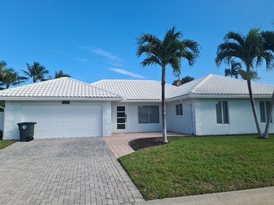 Residential Roofing Installation using 1" Nail strip metal roof by BLUES BROTHERS CONSTRUCTION CORP