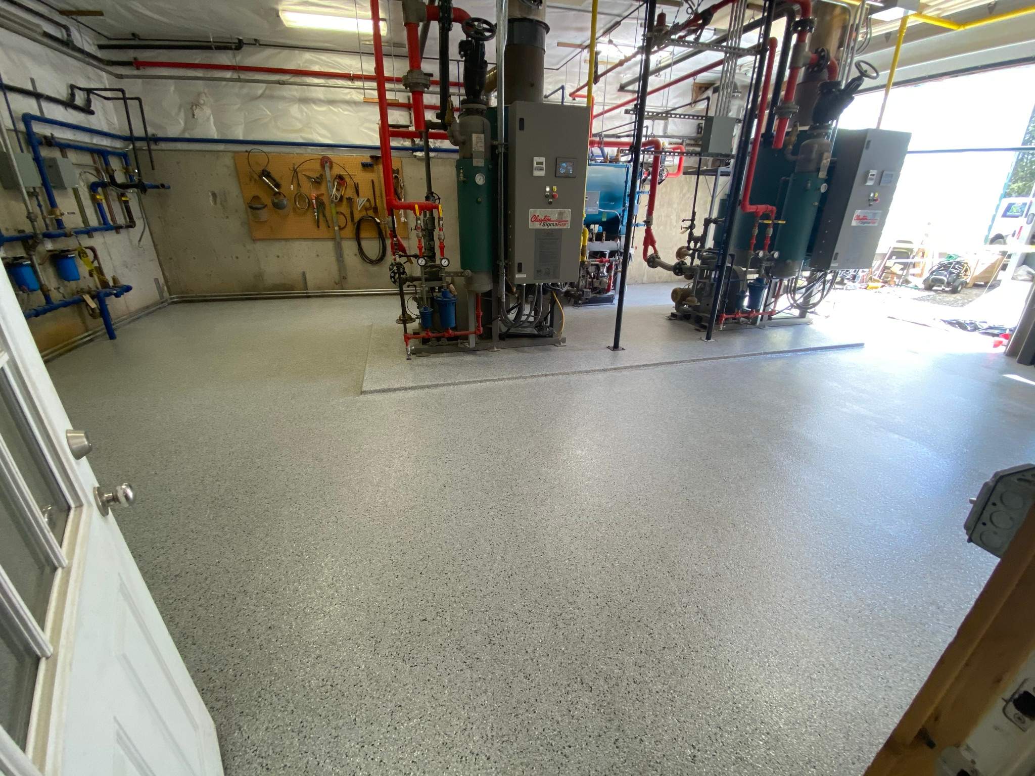 Commercial Floor Transformation using North Pole with Green by Croc Coatings, LLC