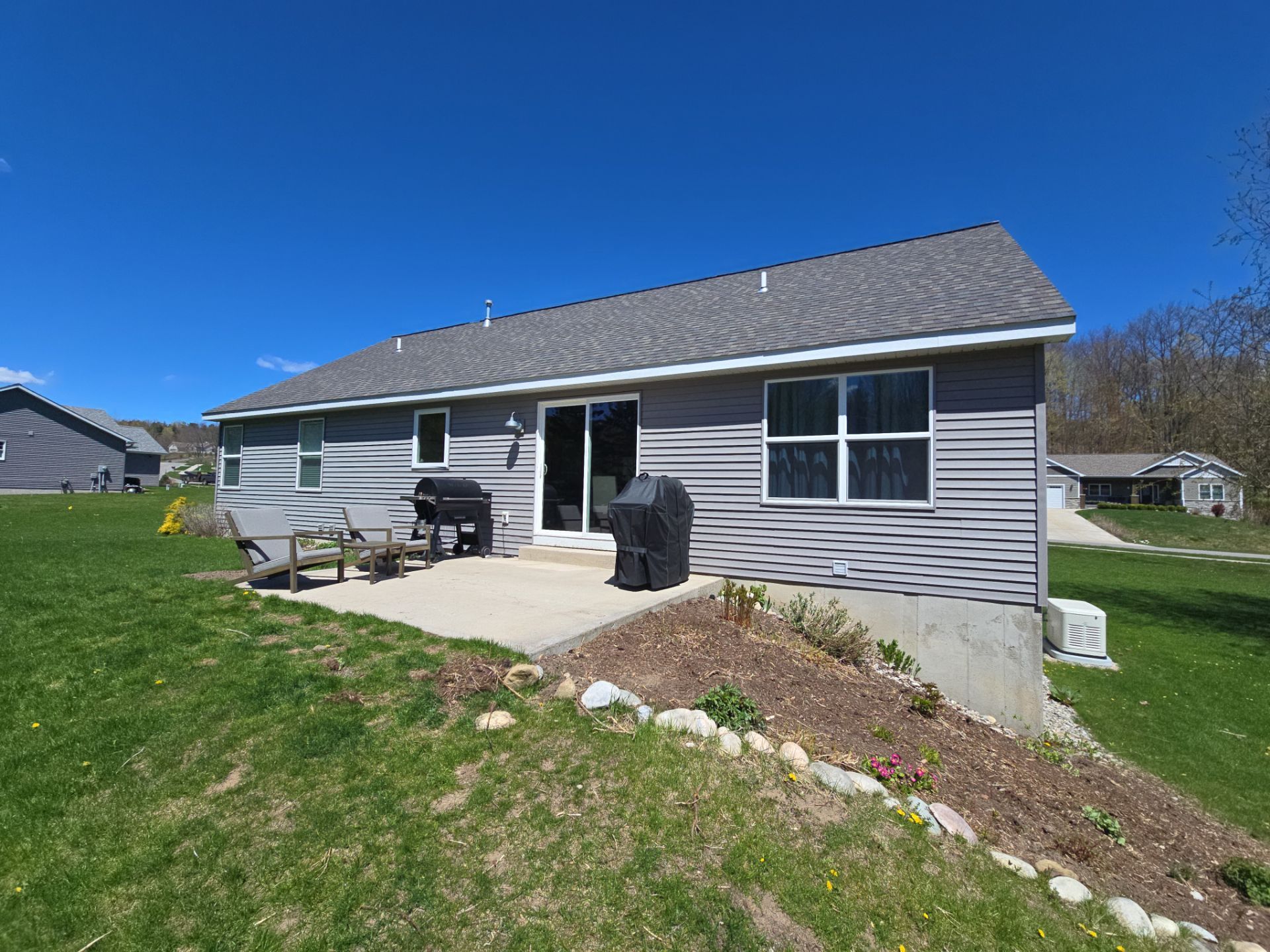 Gutter and Downspout Installation for Traverse City Residential Home by Rainbow Seamless Systems