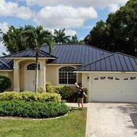 24ga 1.5" Mechanical Seam Matte Black by Total Roofing System The Metal Roof Experts