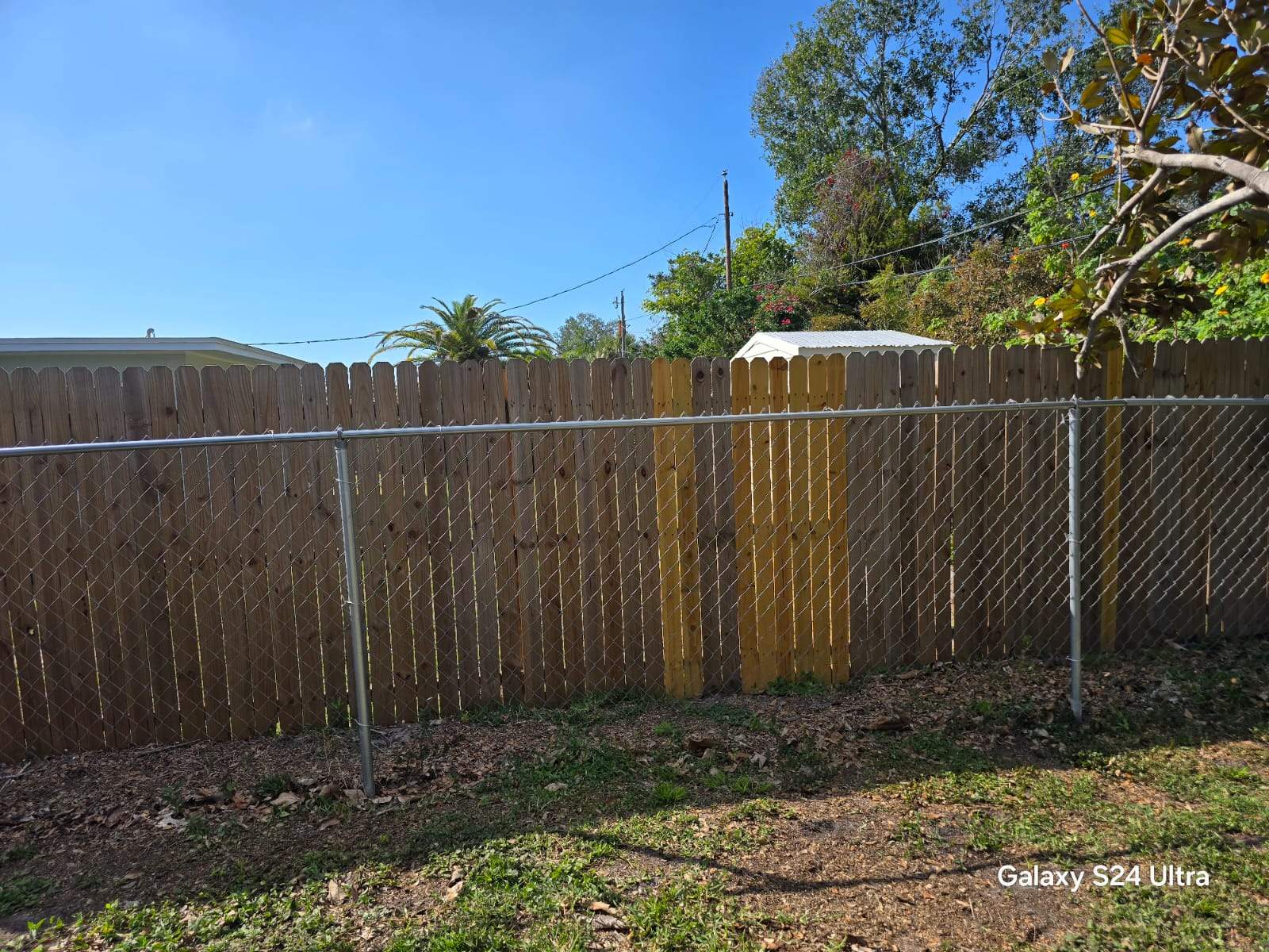 Vinyl and Chain Link Combo in Venice by True Fence LLC