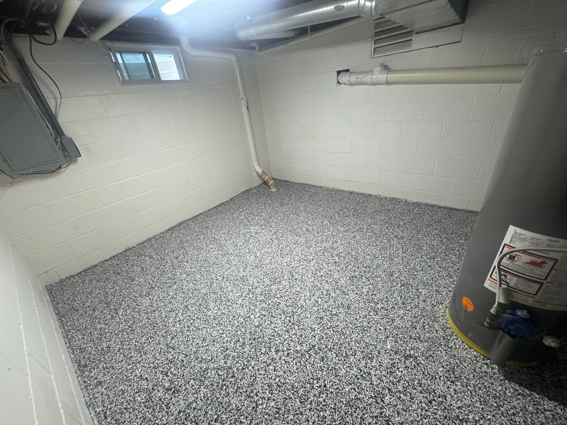 Repaint Walls and Apply Epoxy Flooring by Midwest Paint LLC