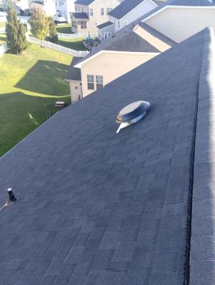 Residential Roofing Installation using Atlas Pinnacle Pristine Black Architectural Shingles