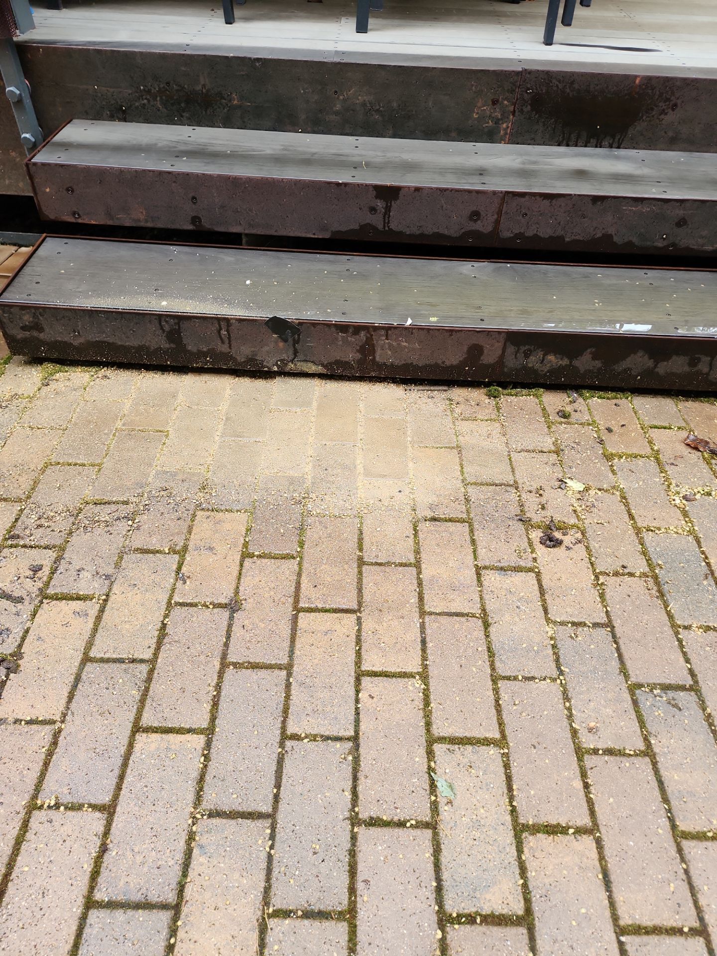 Brick paver repair, cleaning, sealing and poly sanding by Northern Power Washing LLC.