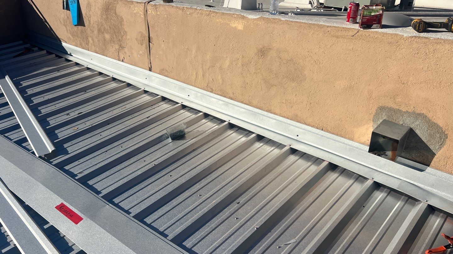 Silver Metallic Exposed Fastener by Reimagine Roofing