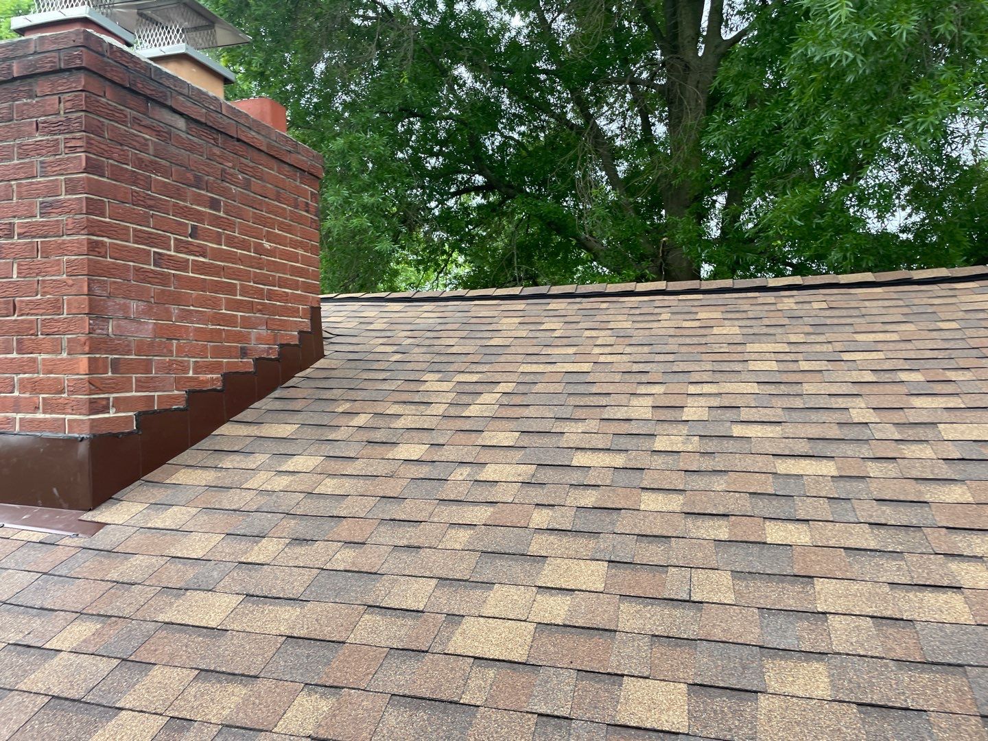 Roof Replacement - Owens Corning Dessert Rose by American Home Contractors