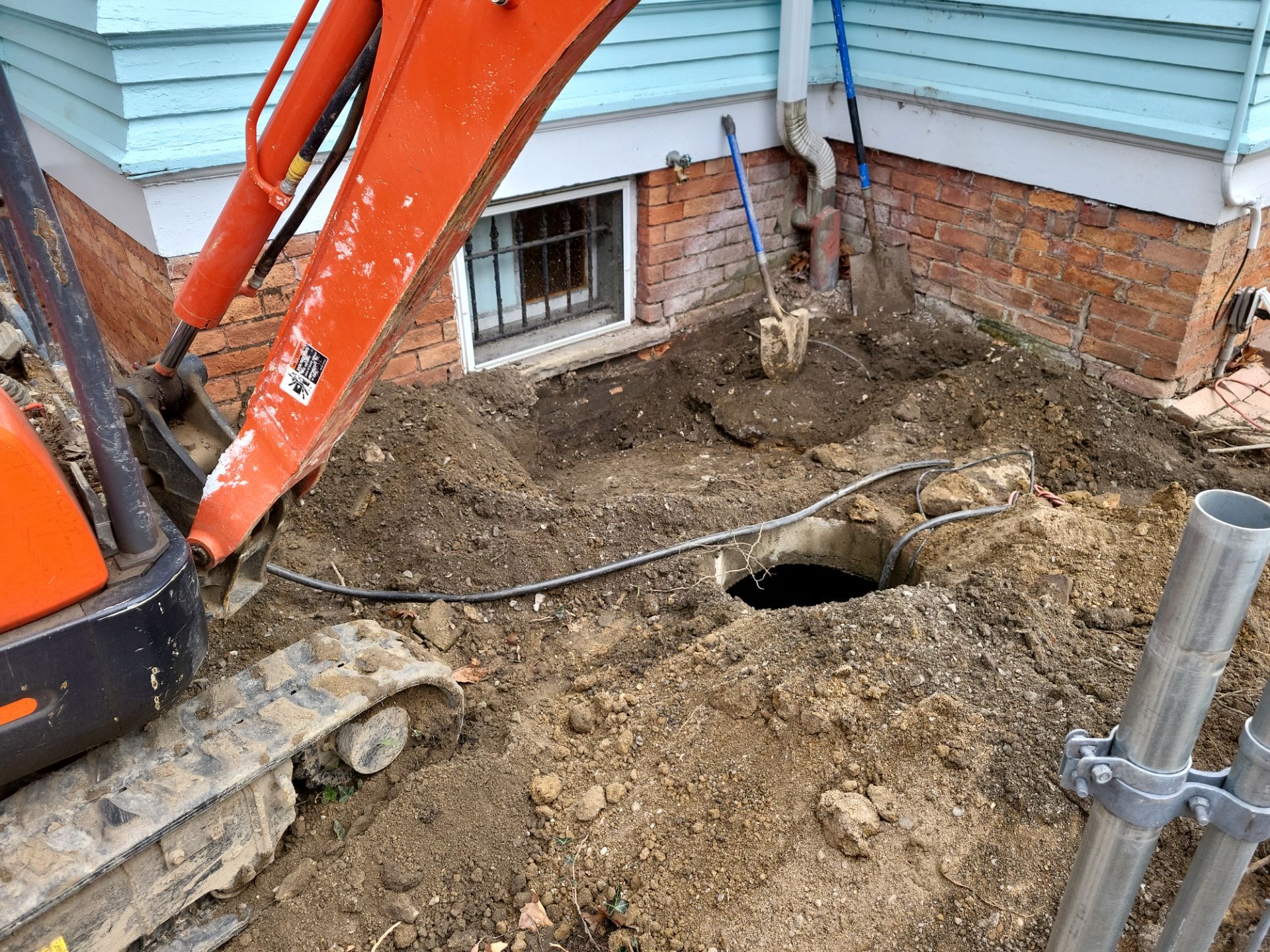 Exterior Basement Waterproofing & Combo Sump Backup System by Toledo Basement Repair