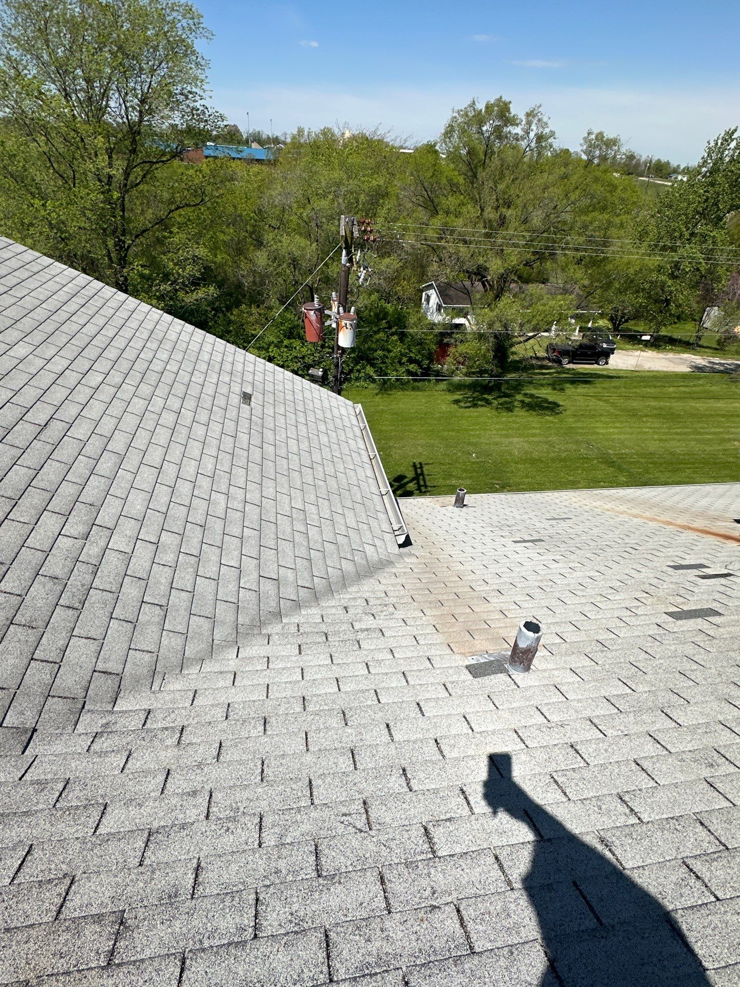 Commercial Roofing Installation using Performance Shingles by Mr. Roofer