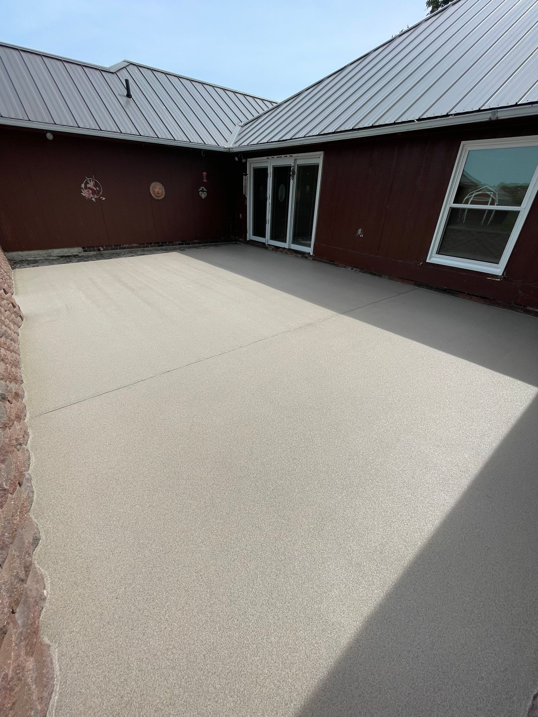Concrete Patio Resurfacing and Protective Coating in Winfred, South Dakota by Select Painting, Coatings & Garage Cabinets
