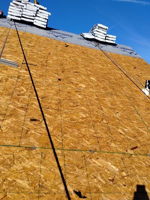 Residential Roofing Installation using Atlas Pinnacle Pristine Black Architectural Shingles by Frederick Roof Repair