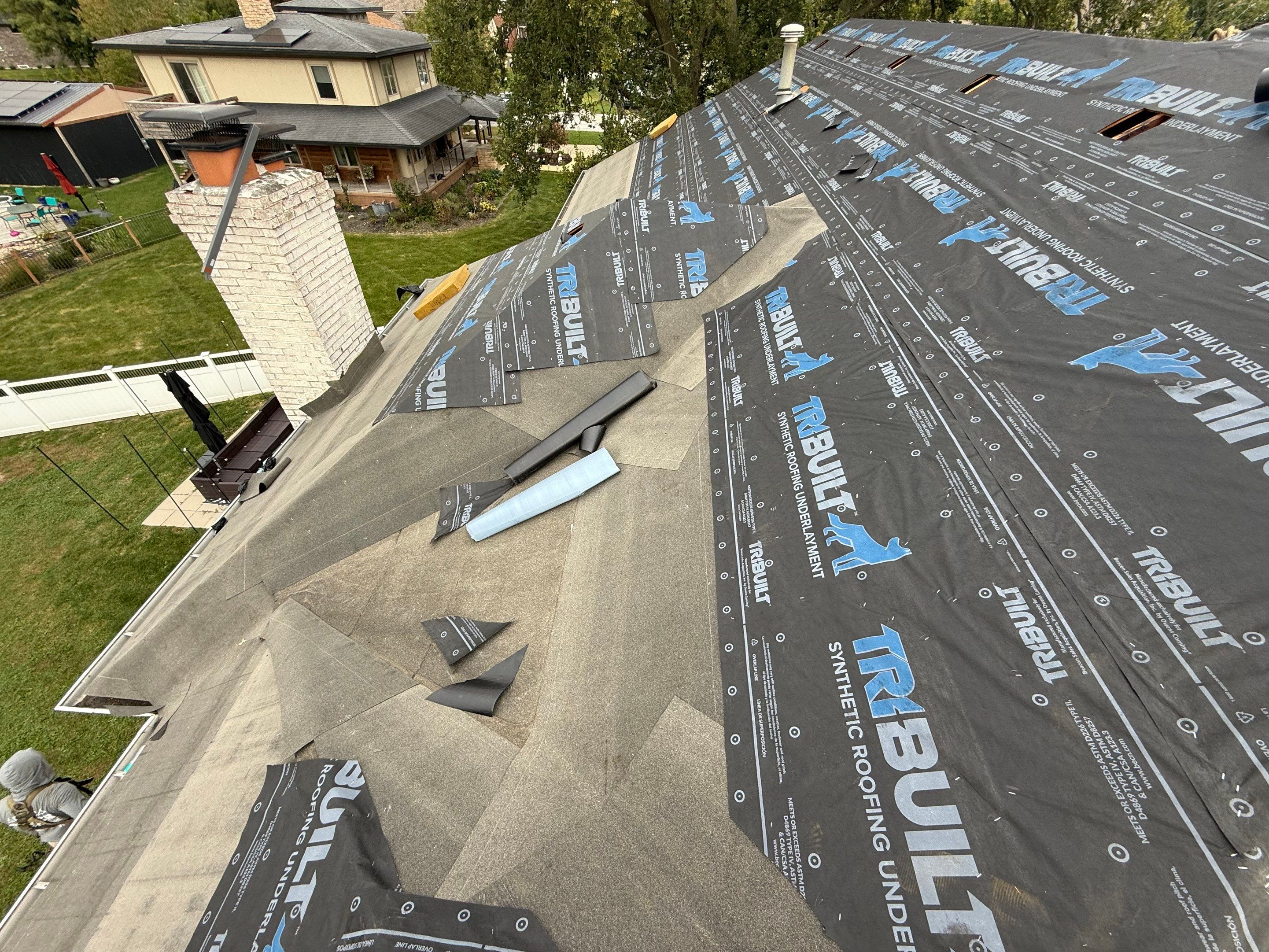 Roof and windows by Optimal Home Improvement 