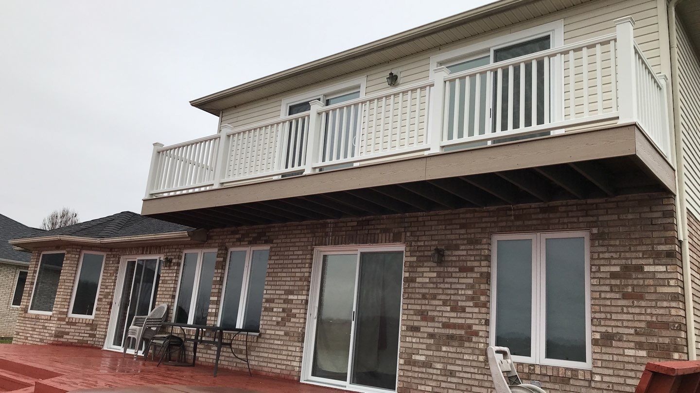 Deck Refurbush and Door Replacement using Trex Decking and Railing. Polaris Patio Doors by Secure Construction Company Inc