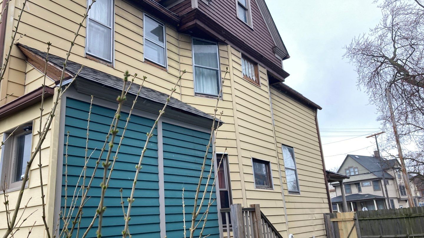 James Hardie Siding on Antique Home by Absolute Roofing and Construction