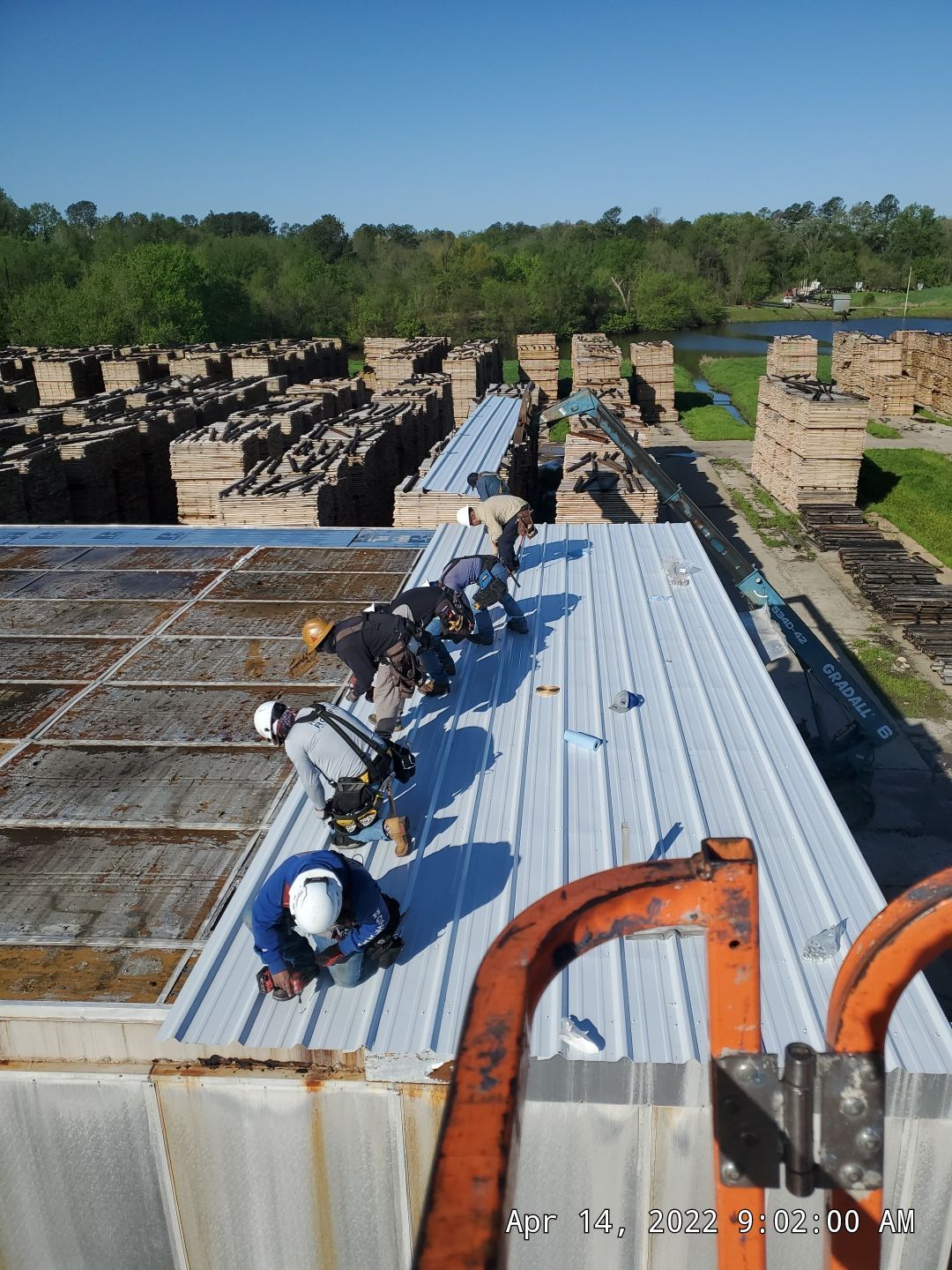 Commercial Roofing Installation using Aluminum Roofing panels by Hostetler Roofing