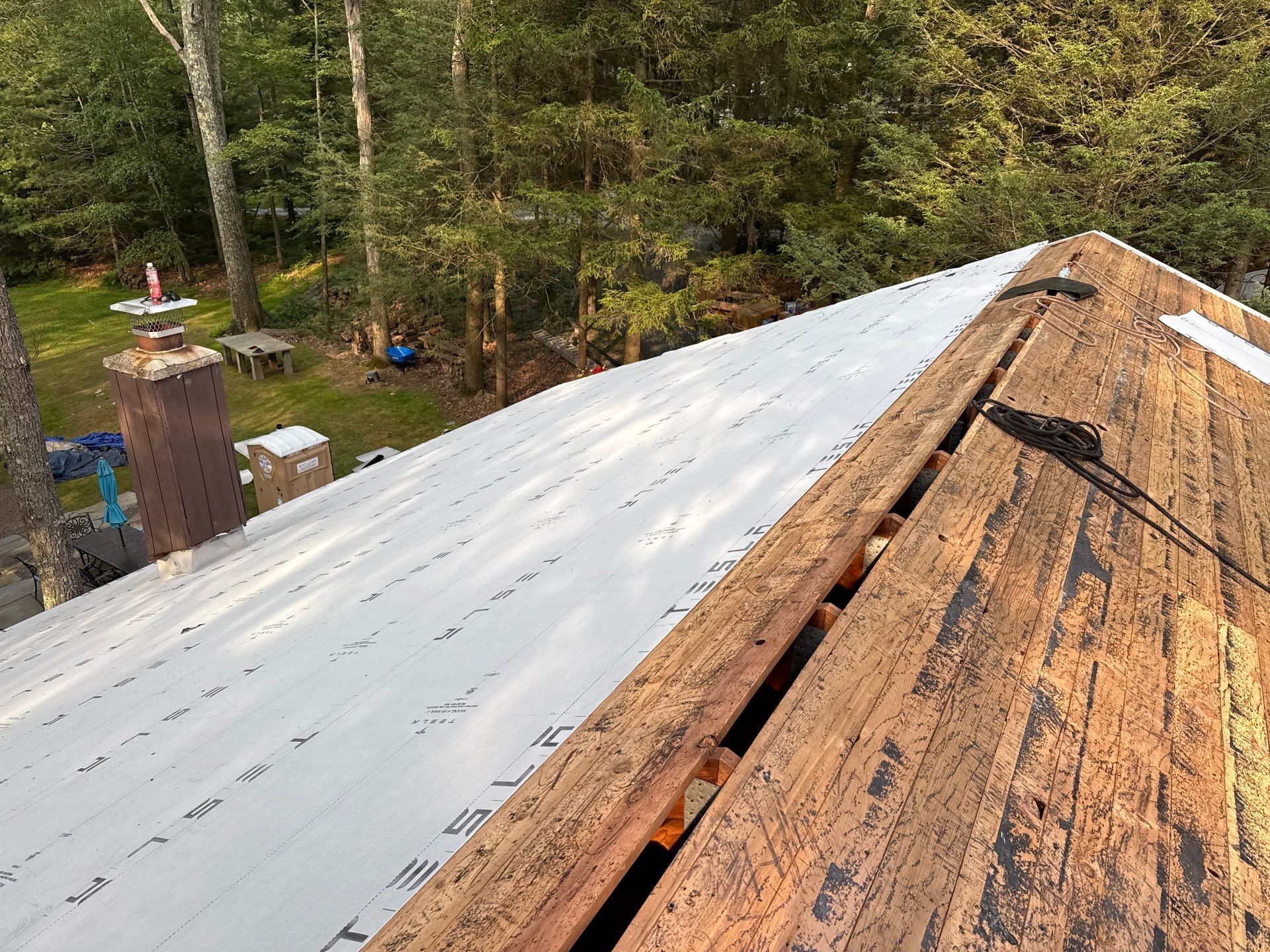 Stunning Tesla Solar Roof Cabin in the Woods by American Home Contractors
