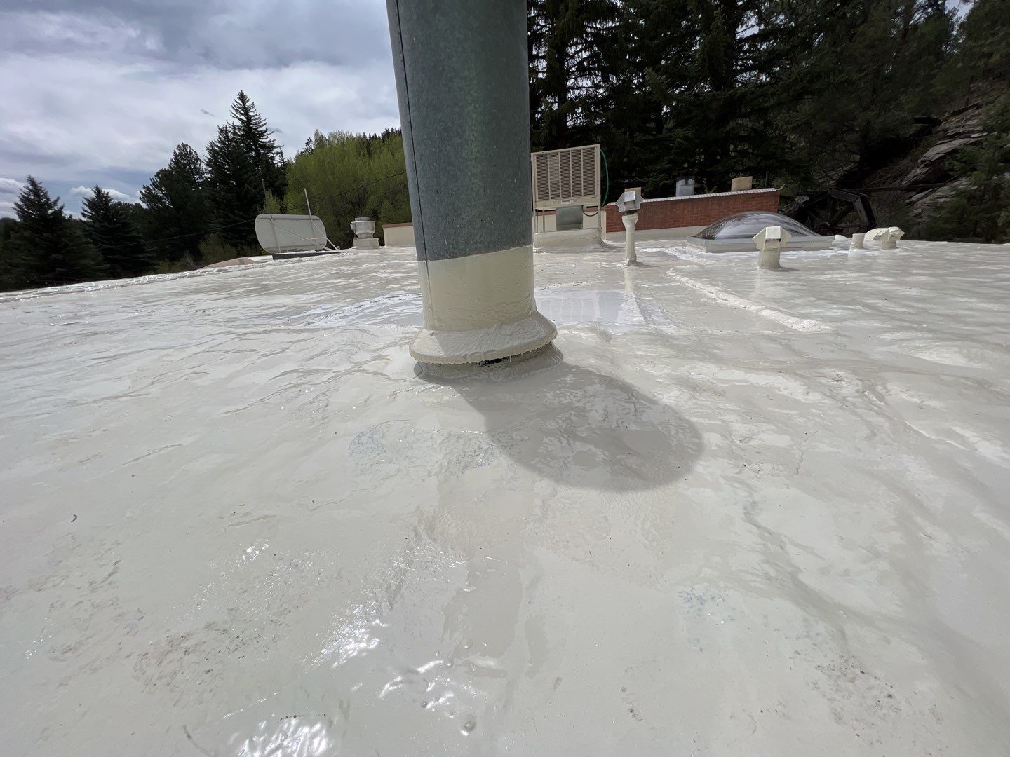 Commercial Roofing Installation using CASTAGRA ECODUR COATING by A to Z Roofing