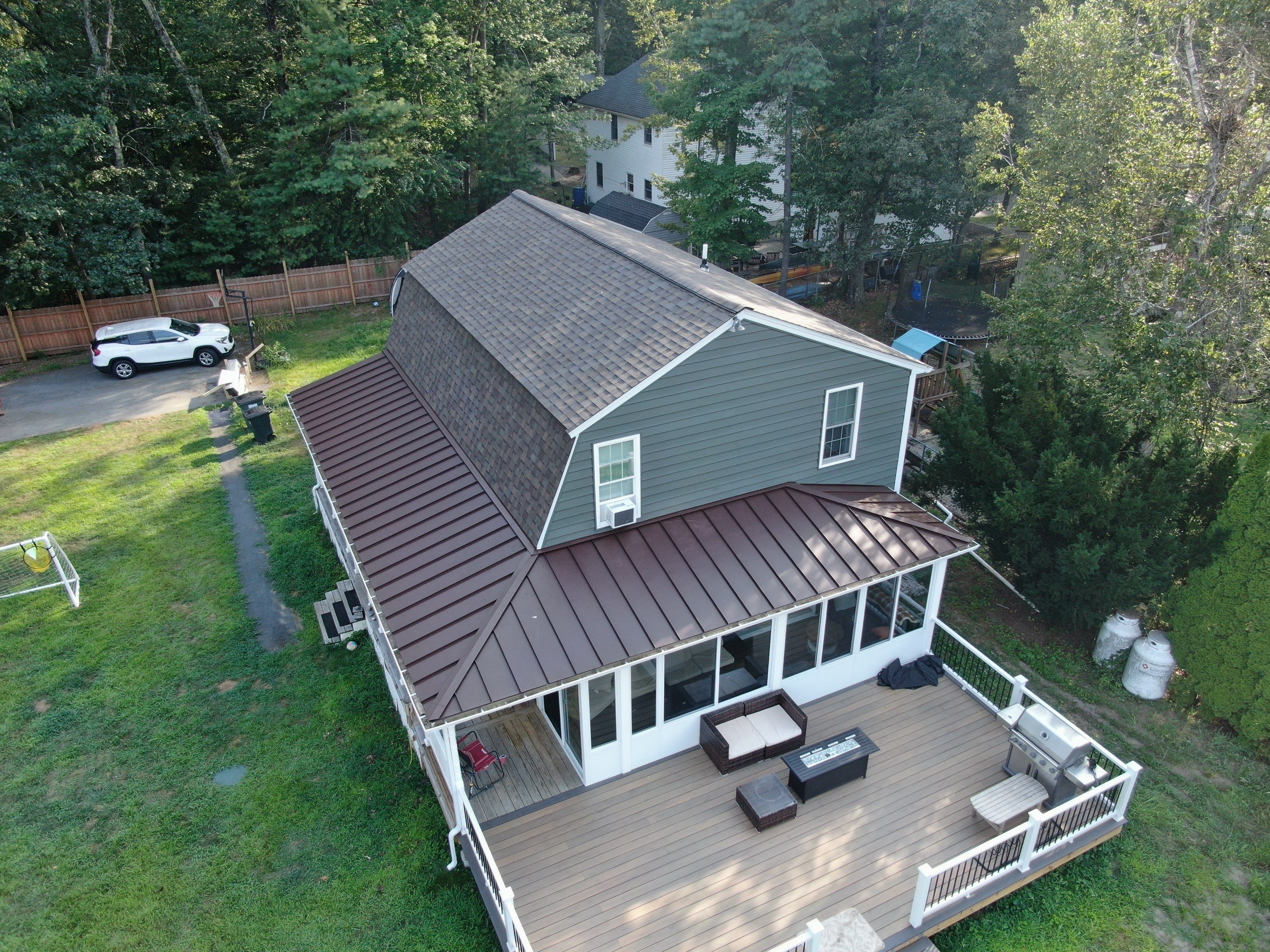 Full Roof Replacement & Farmers Porch Restoration – Asphalt + Standing Seam Metal by Mighty Dog Roofing of Greater Middlesex County