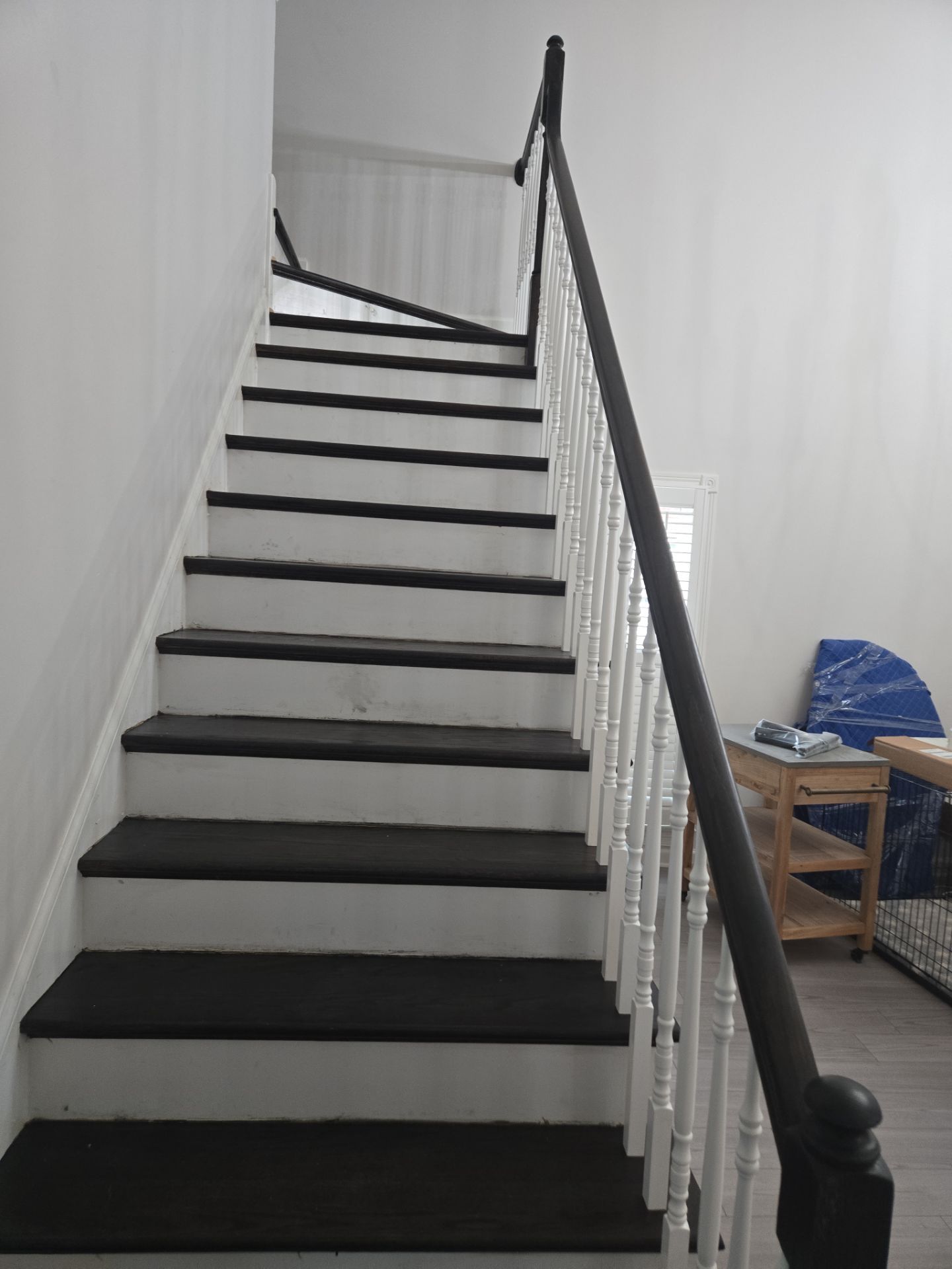 Updated staircase and hallway by Footprints Floors of Nashville