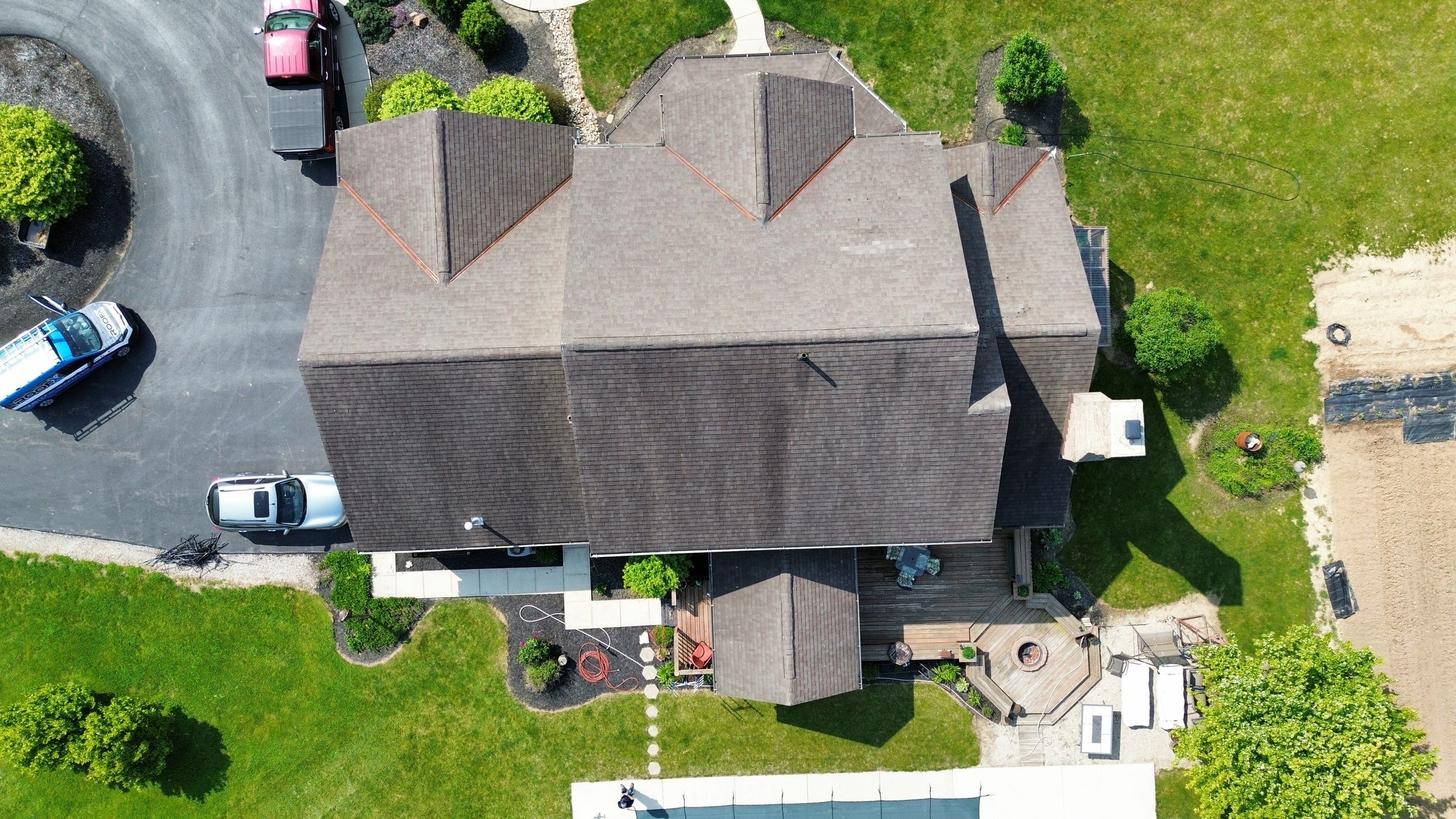Residential Roofing Installation using Performance Panel Metal - Burnished Slate by RoofX 