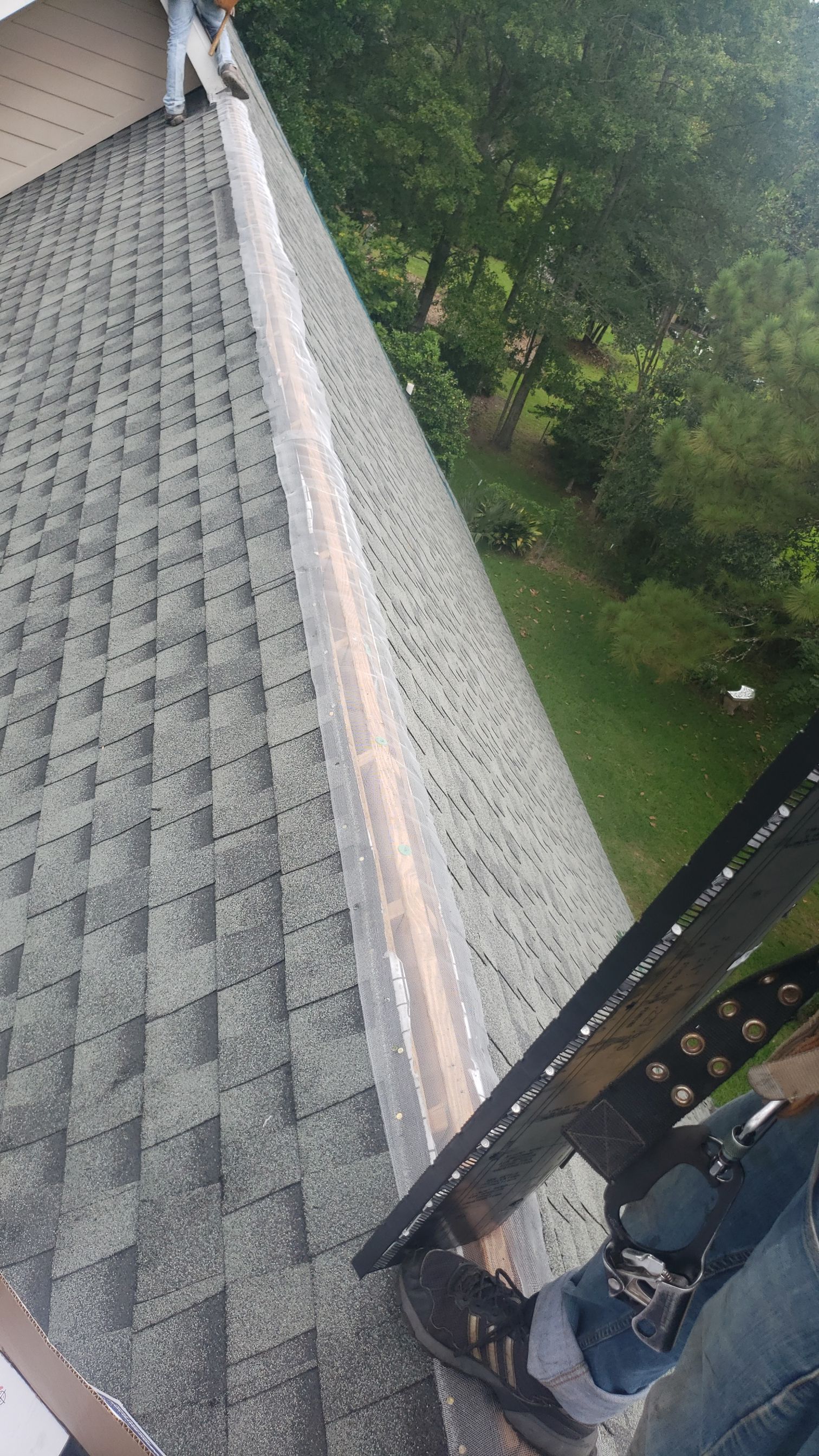 Residential Roofing Installation using Roof Replacement by American Roofing & Construction LLC