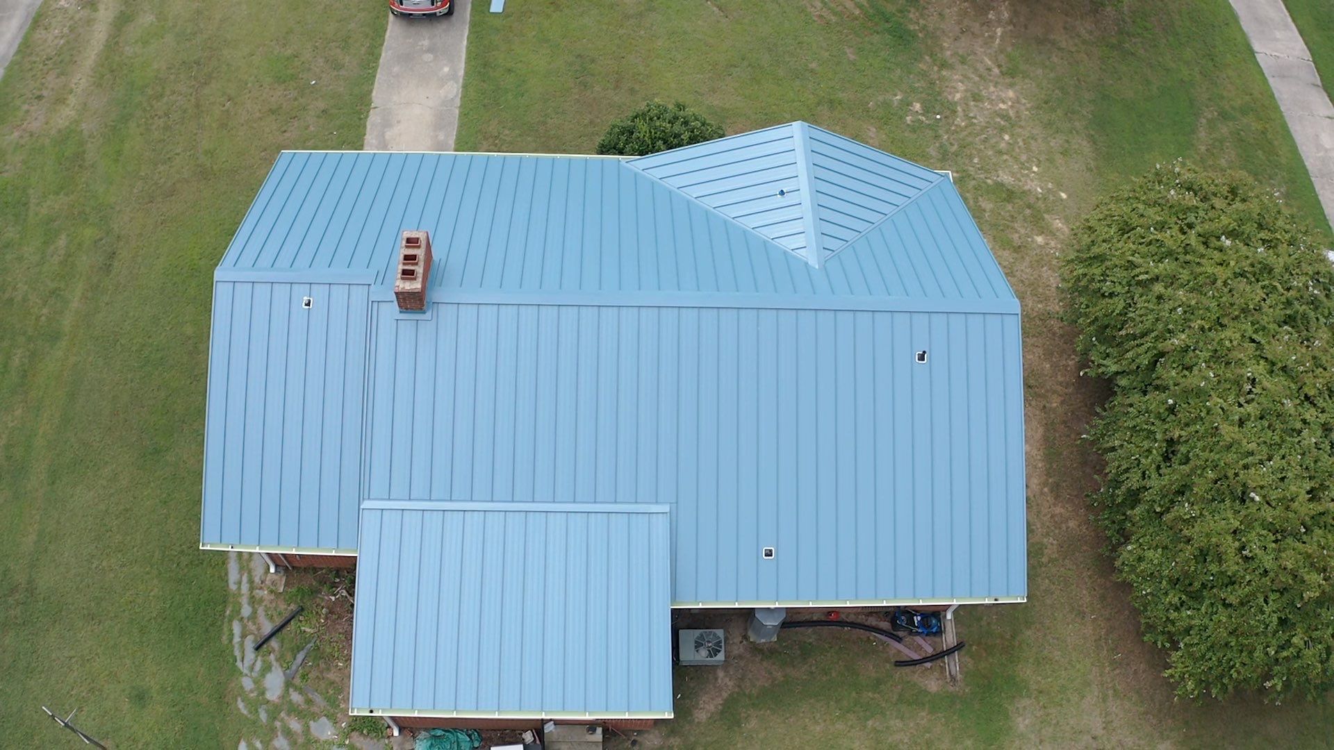 Carolina Blue Standing Seam Roof by Just In Time Roofing and Restoration