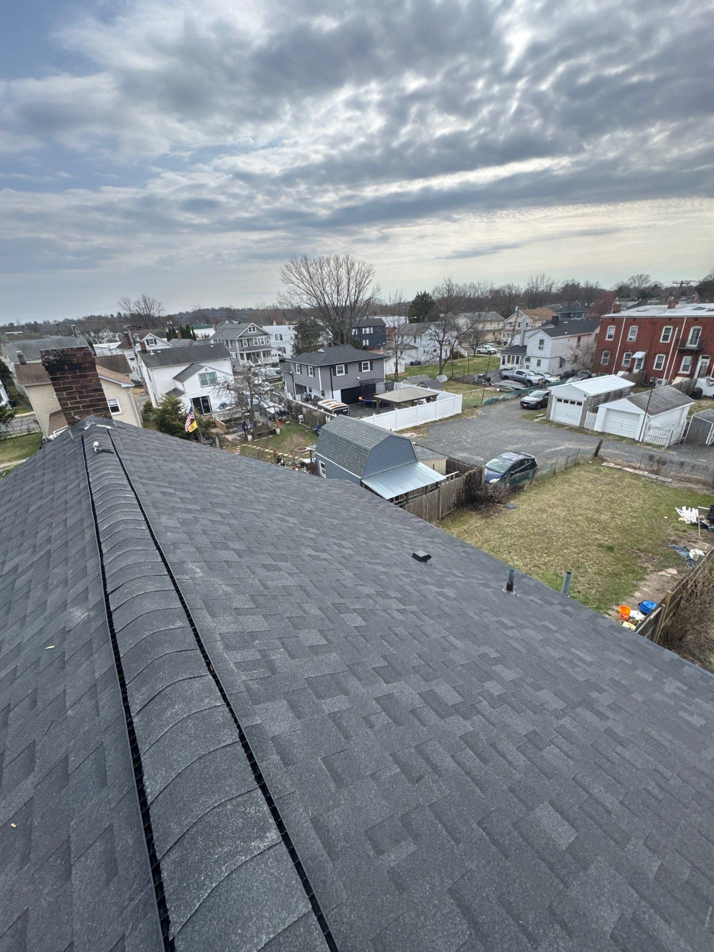Onyx Black Shingles by Reimagine Roofing