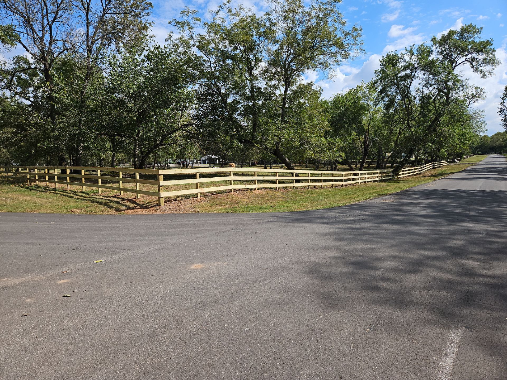 Ranch Style fence Plus Iron installation by Tim's Fences