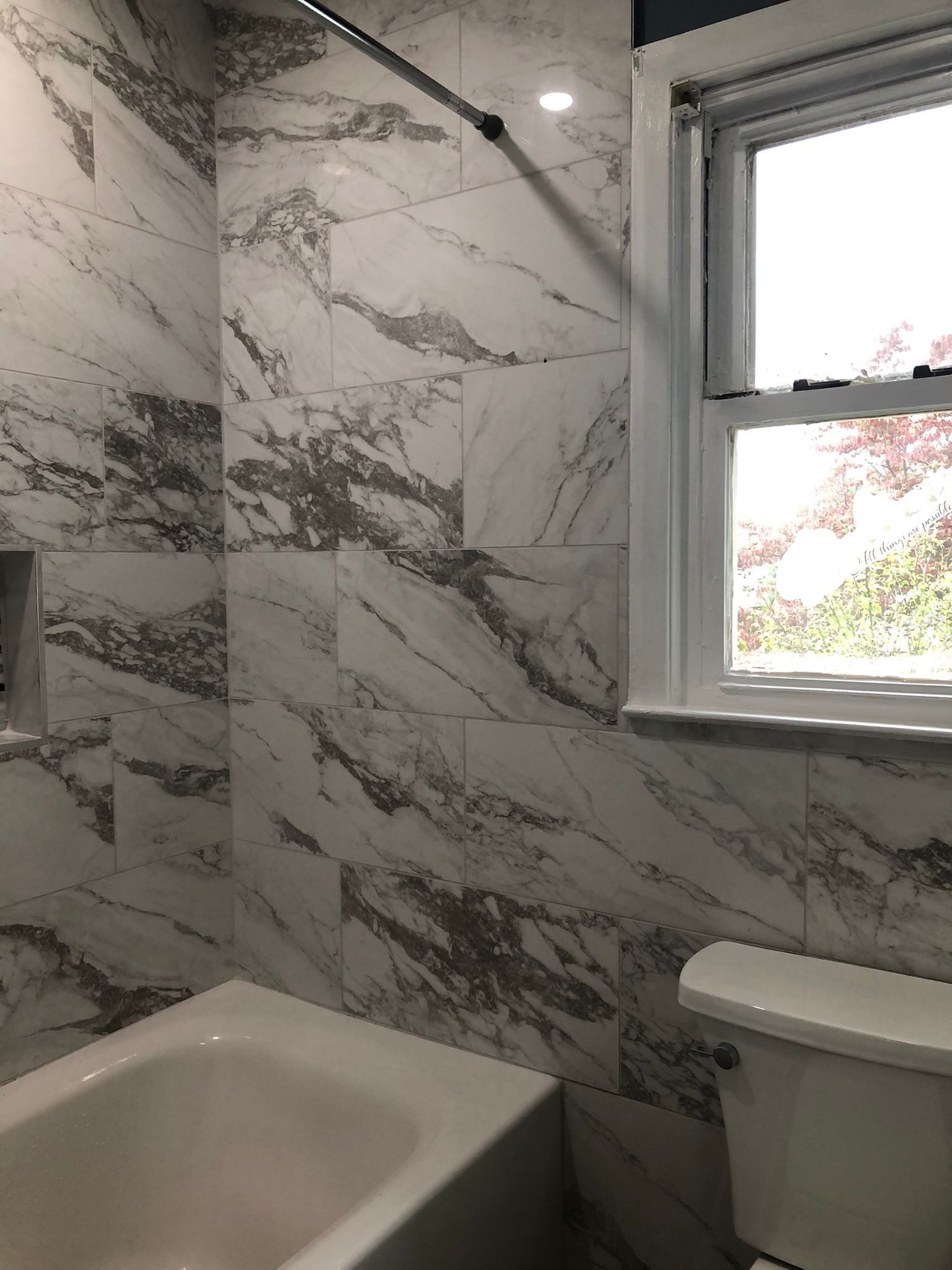 Bathroom Remodel using Tile by Home Concepts Construction