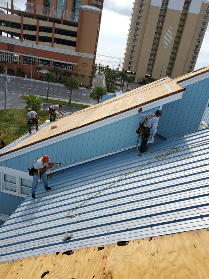 Commercial Roofing Installation using Metal roofing by American Roofing & Construction LLC