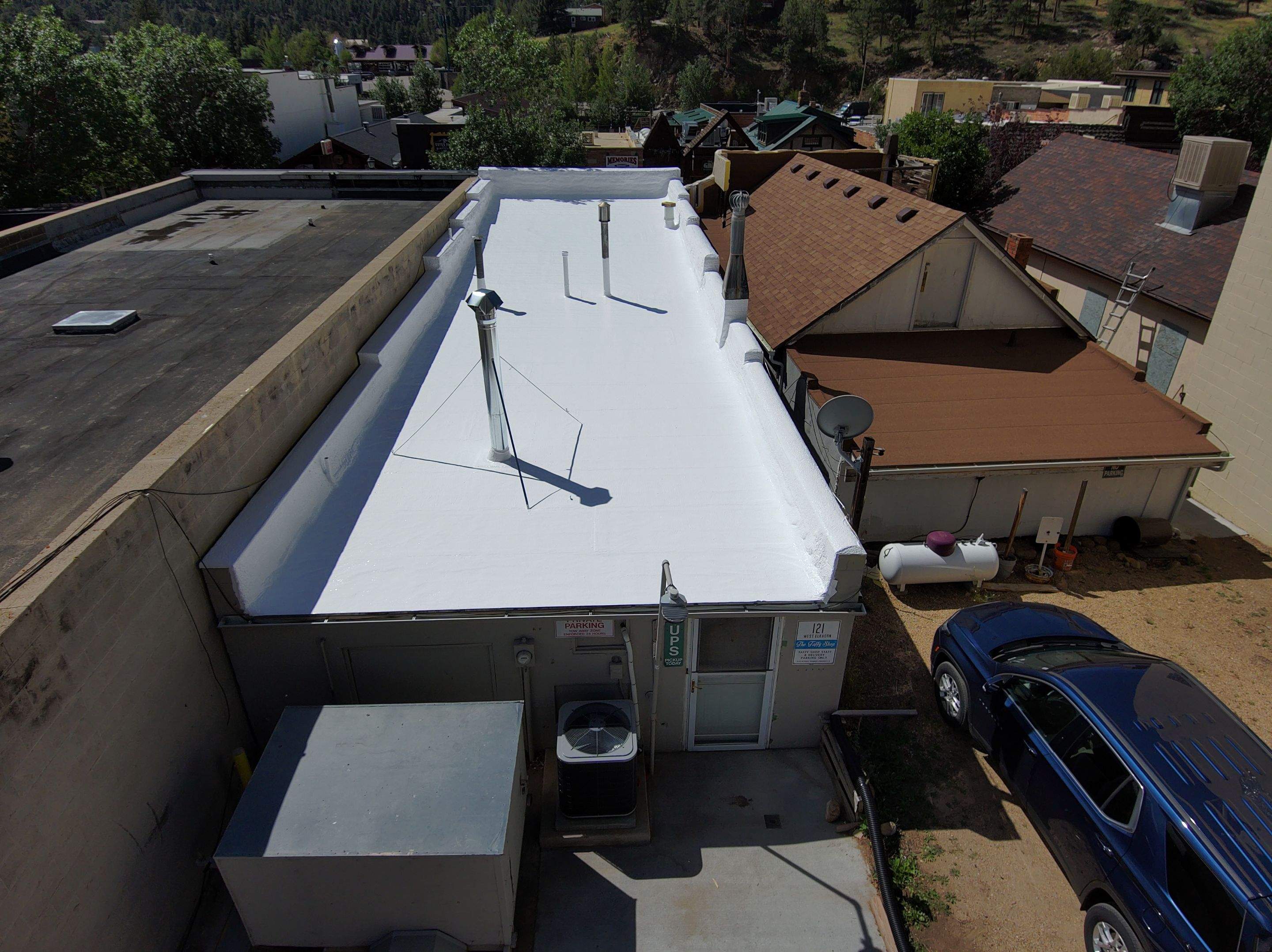 Estes Park "The Taffy Shop" Before & After Gaco Coating by Blue Peaks Roofing LLC