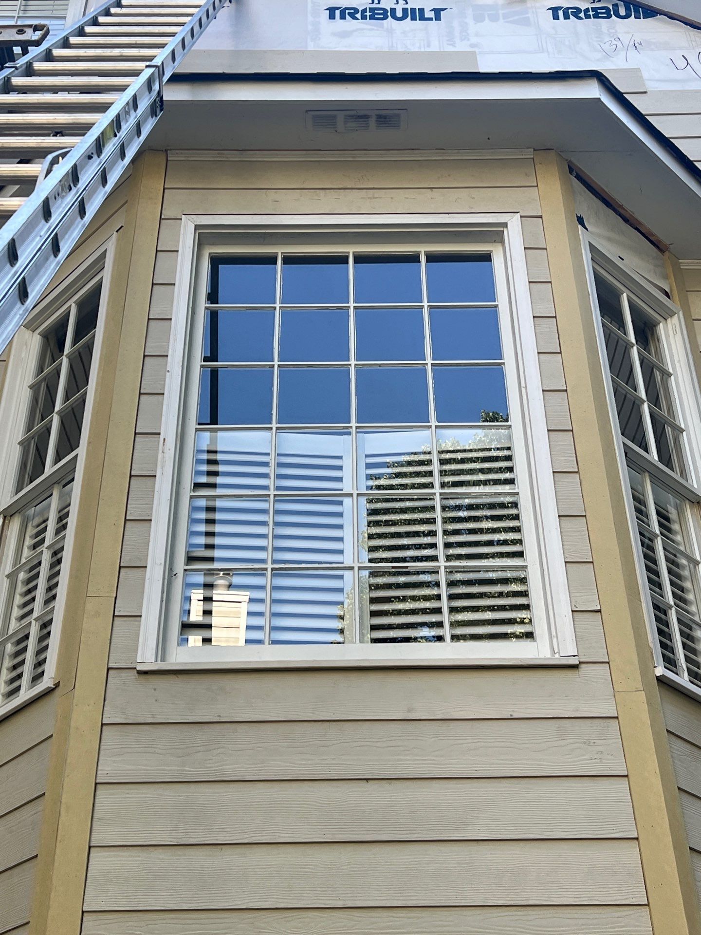 Blue Exterior Paint and Siding Installation using James Hardie Lap Siding by Nelson Exteriors