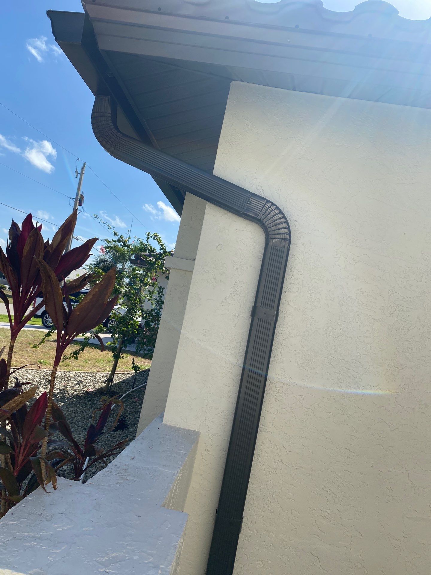 Black Seamless Gutters for Modern Homes in Punta Gorda by Gutter Professors