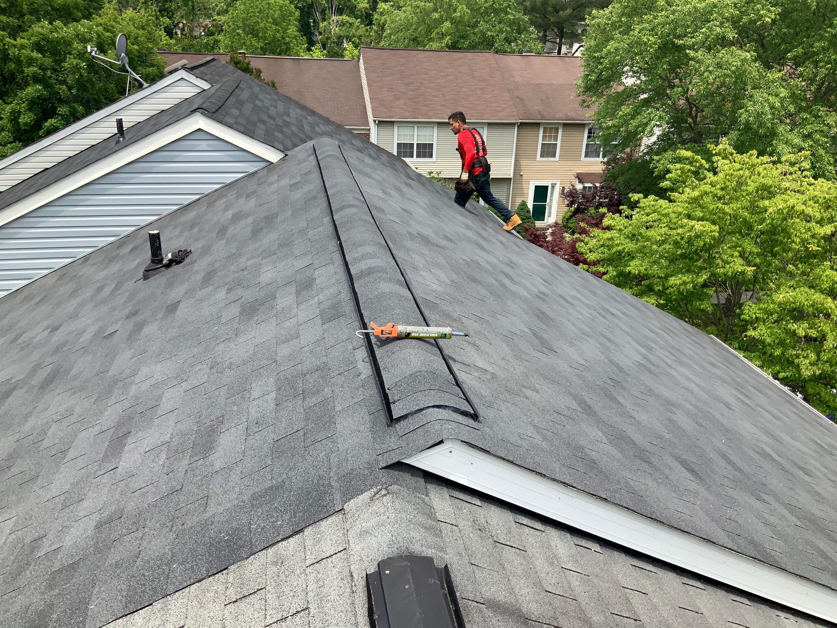 Residential Roofing Installation using XT-25 Color Moire Black by Alpha Design Services