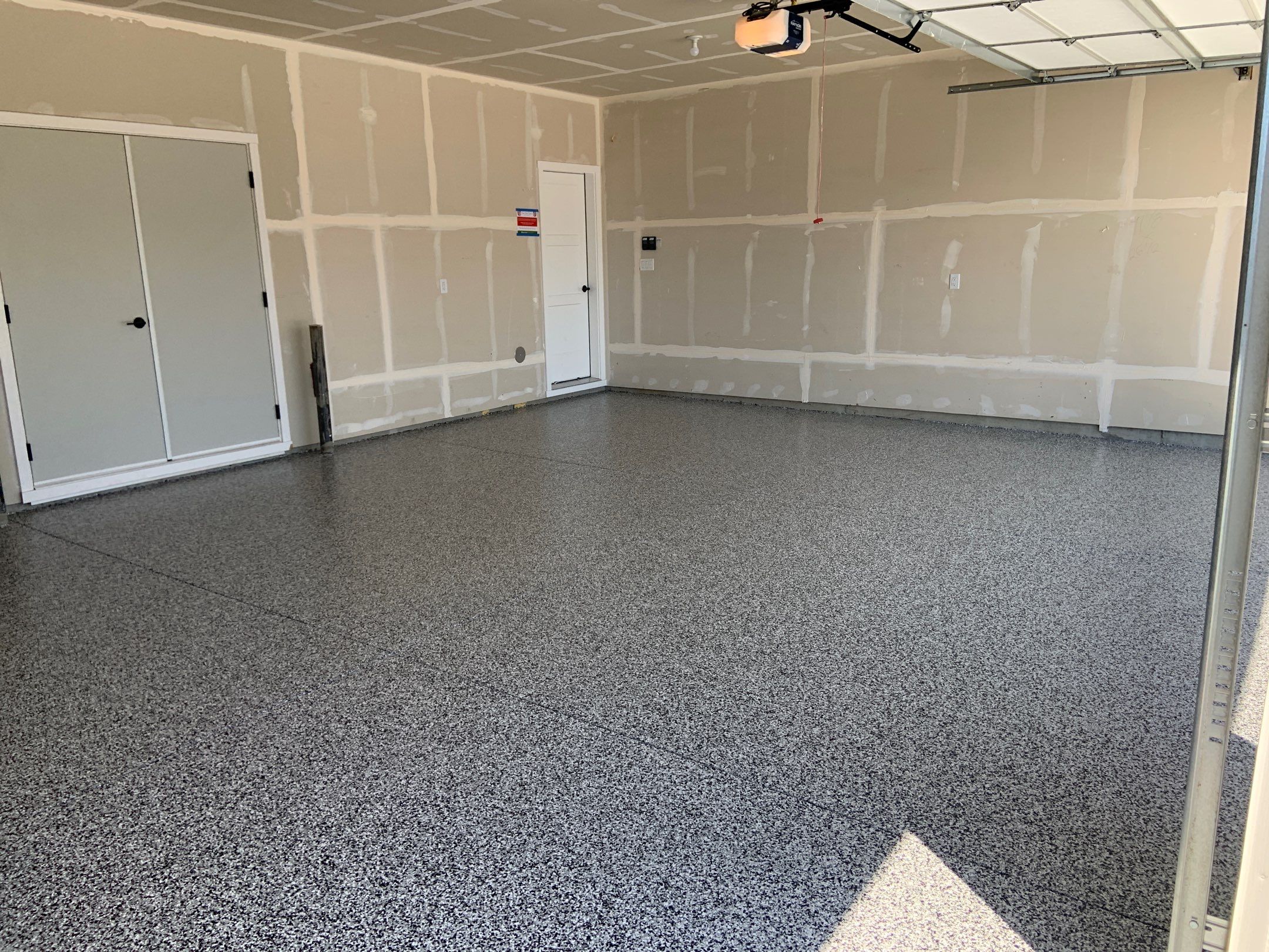 Garage Transformation using Domino by Croc Coatings, LLC