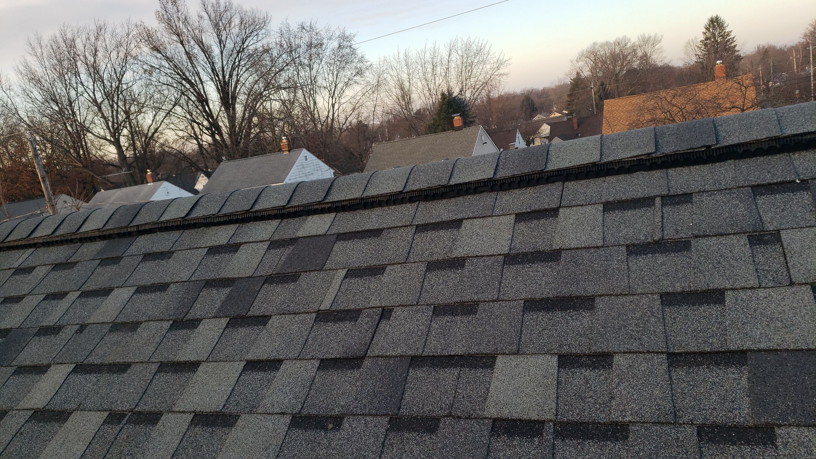 ATLAS PINNACLE COLOR: SCOTCHGARD HEARTHSTONE DRIP EDGE: WHITE by Eagle Eye Roofing