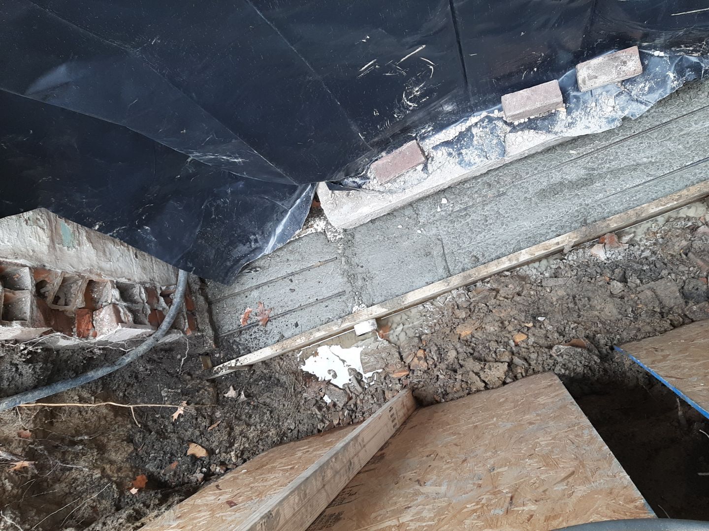 Basement Wall Rebuild with Exterior Waterproofing by Toledo Basement Repair