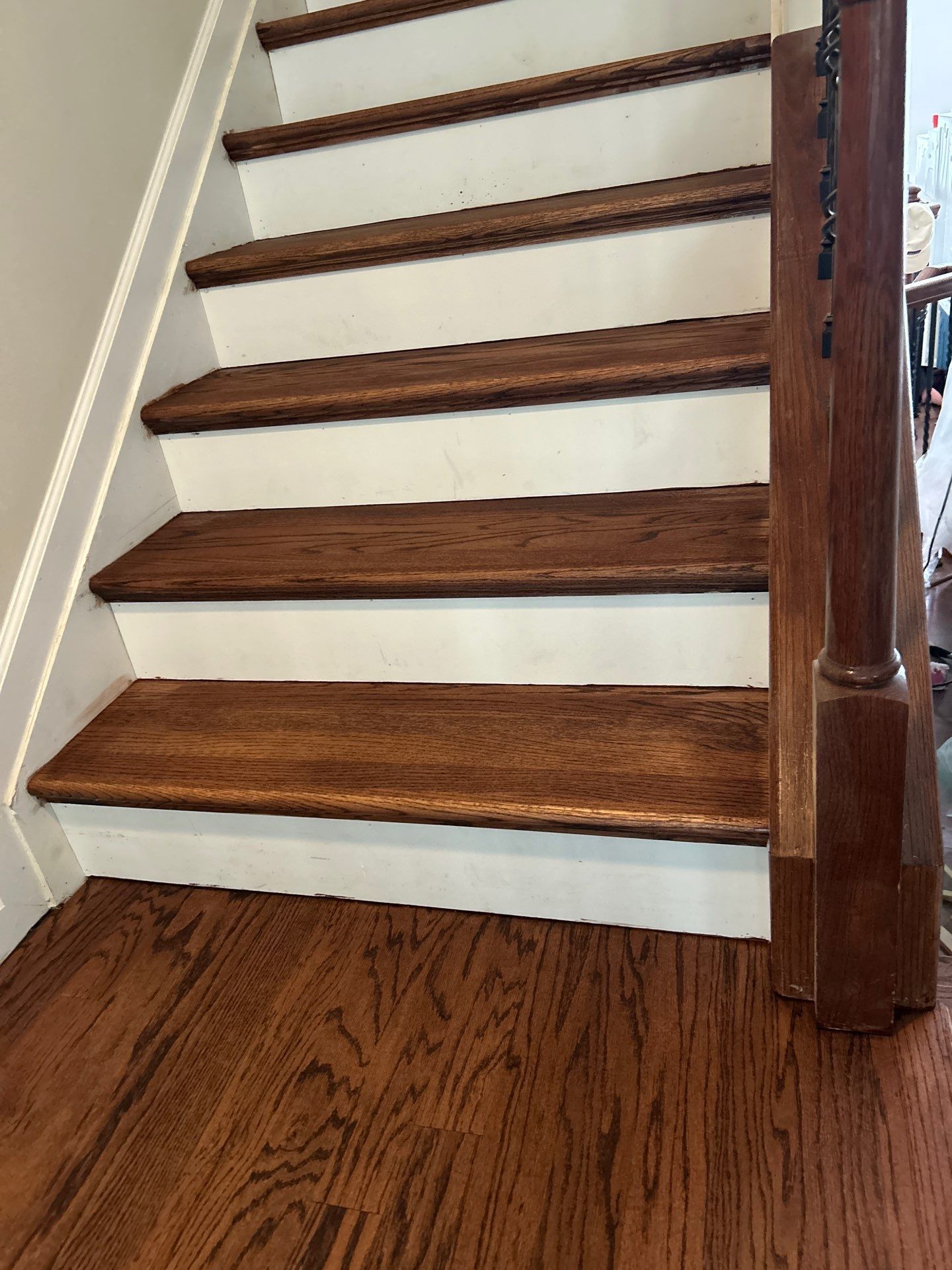 UPGRADE to solid oak stair treads by Footprints Floors of East Atlanta