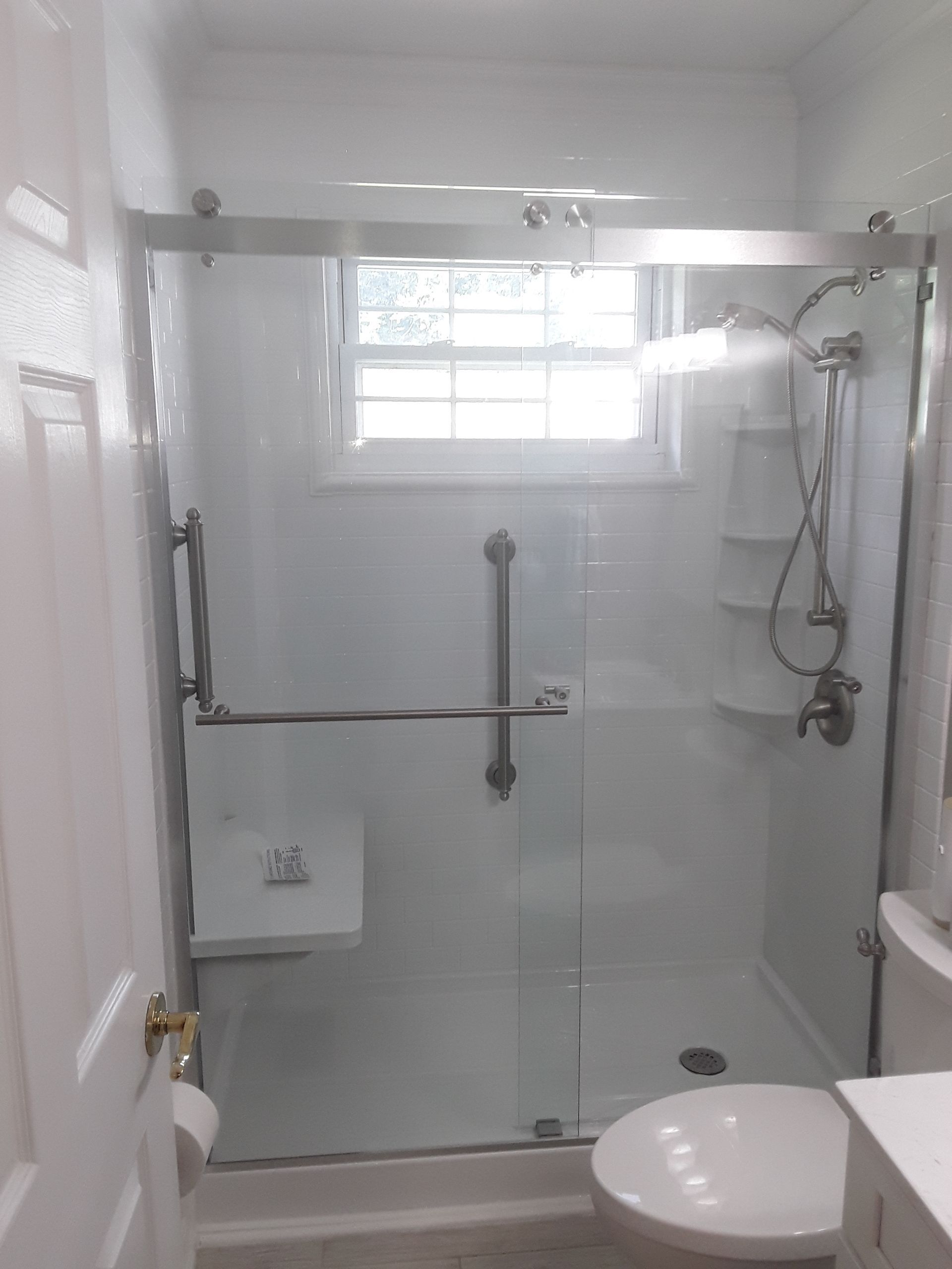 Tub to Shower Conversion using BCI Acrylic Shower System by Secure Construction Company Inc