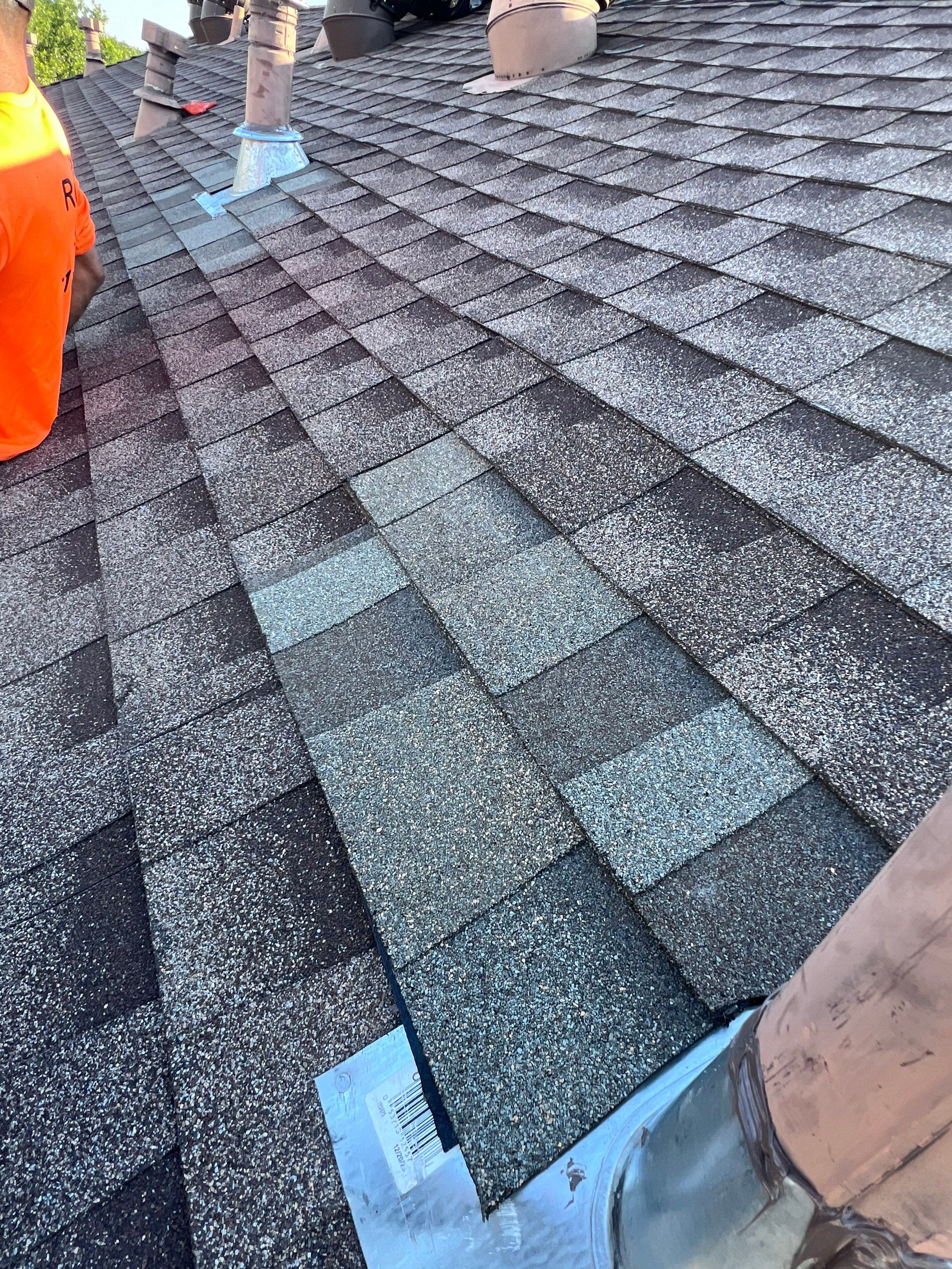 Hail Damage using Owen's Corning Duration (Lifetime) Shingles by Roof Repair Company
