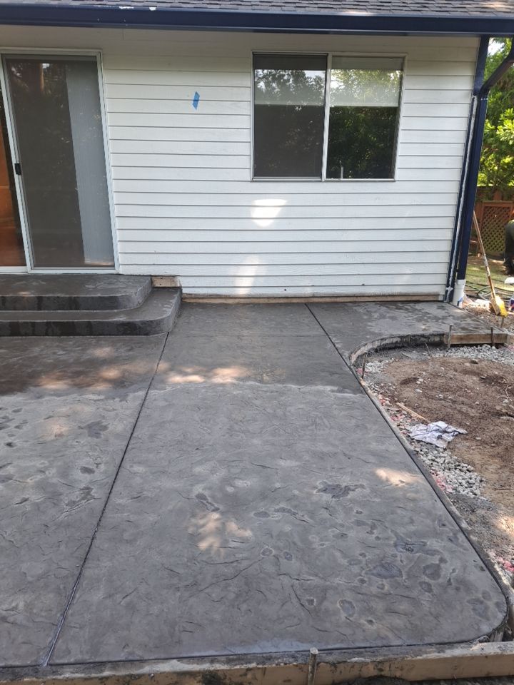 Luo | Colored Stamped Concrete Patio by Jireh Asphalt & Concrete Inc 
