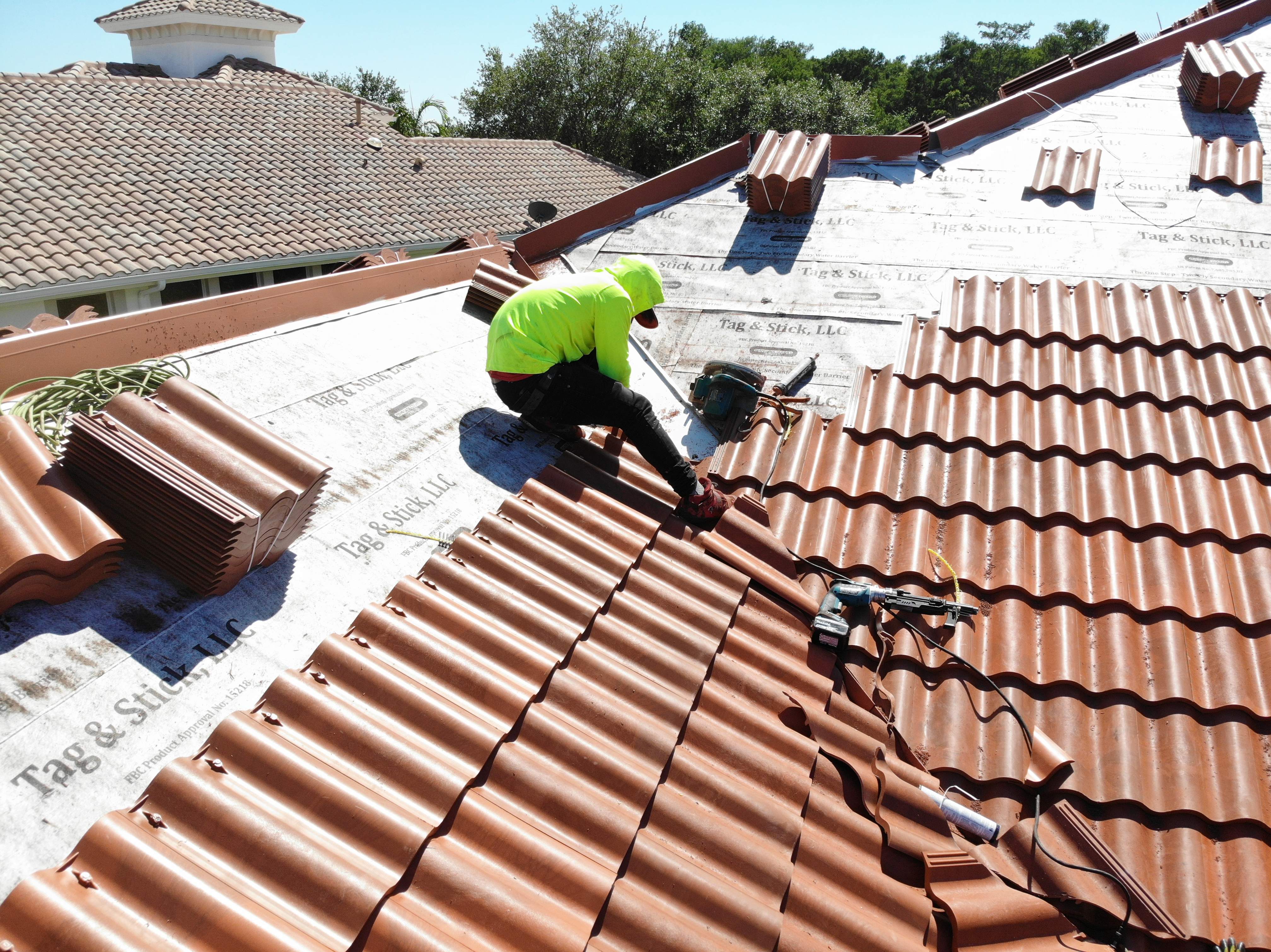 Residential Roofing Installation using Composite Spanish Tile by International Roofing