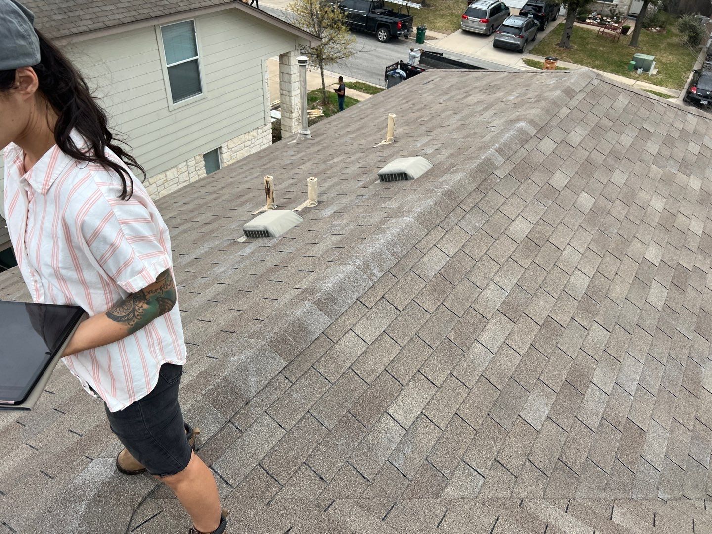 Wind damaged roof replacement by Oakwood Roofing and Construction, LLC