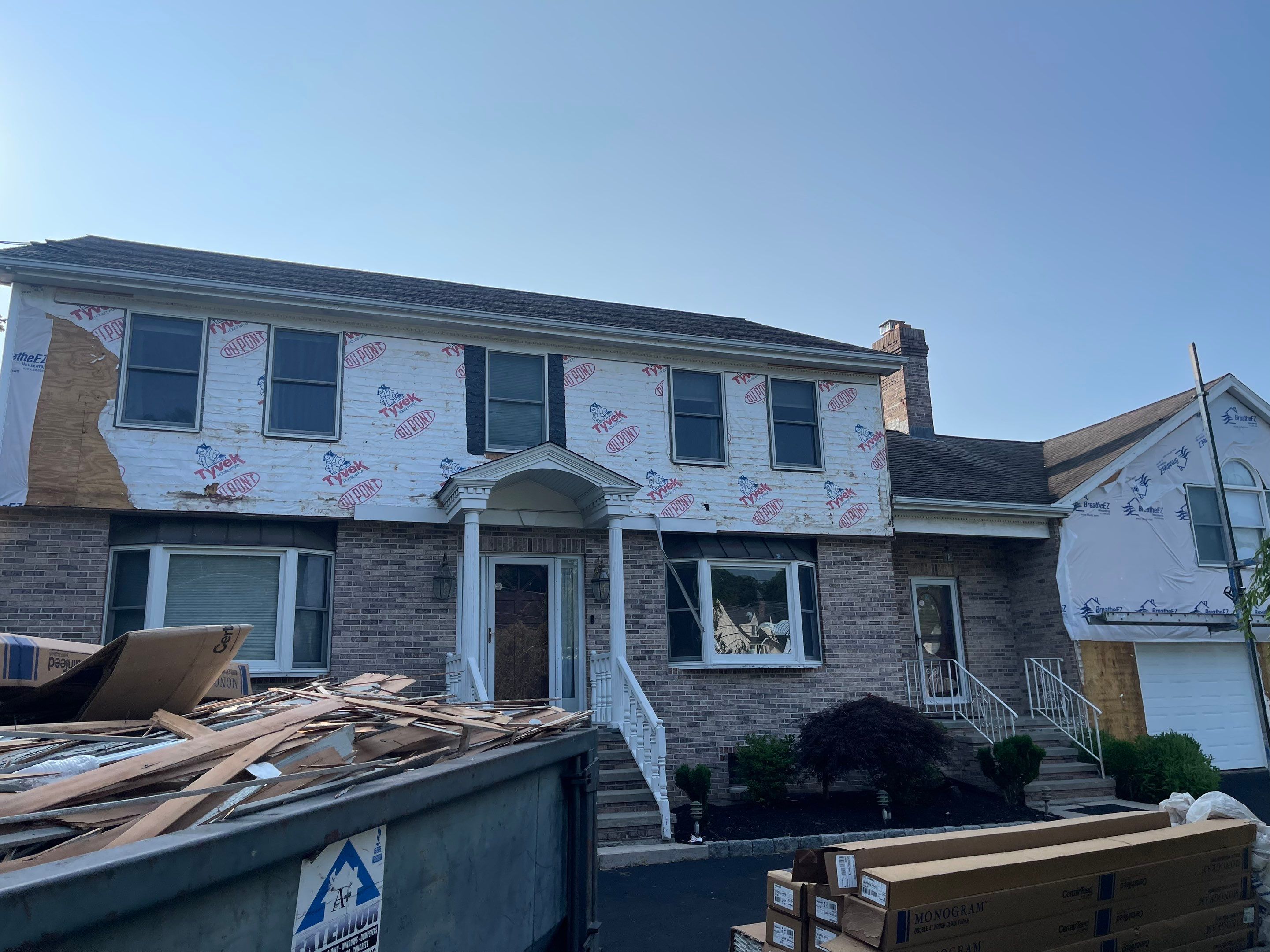 Siding Installation using Mainstreet Colonial & White gutters by A Plus Exterior