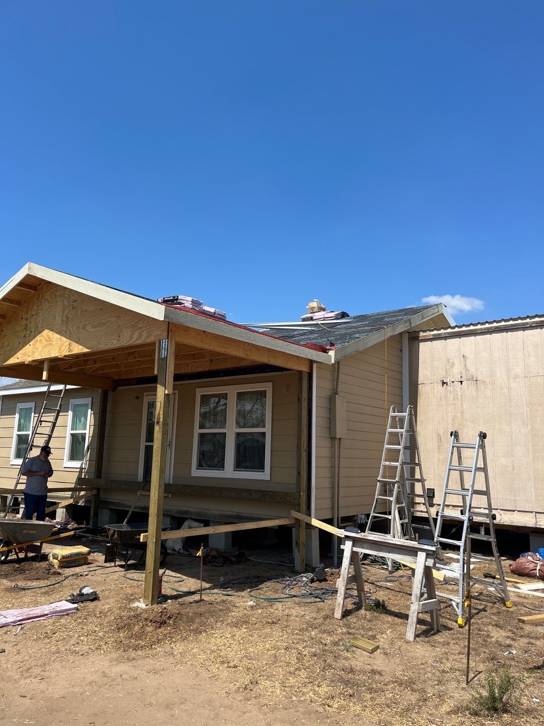 Front Porch Sitt'n by Bayfront Roofing and Construction