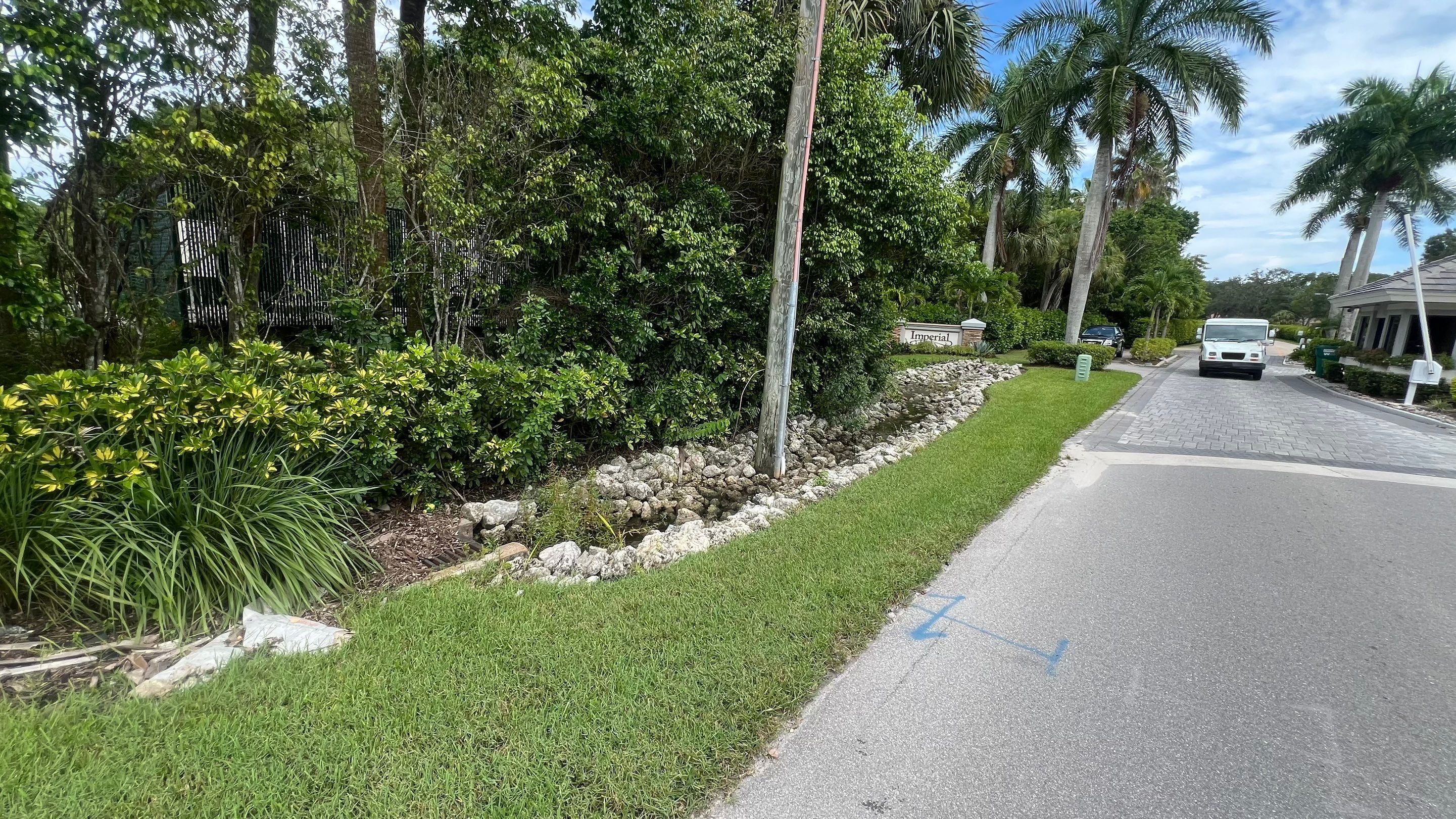 Naples Community Entry Road Stormwater System Cleaning by APS Power & Water